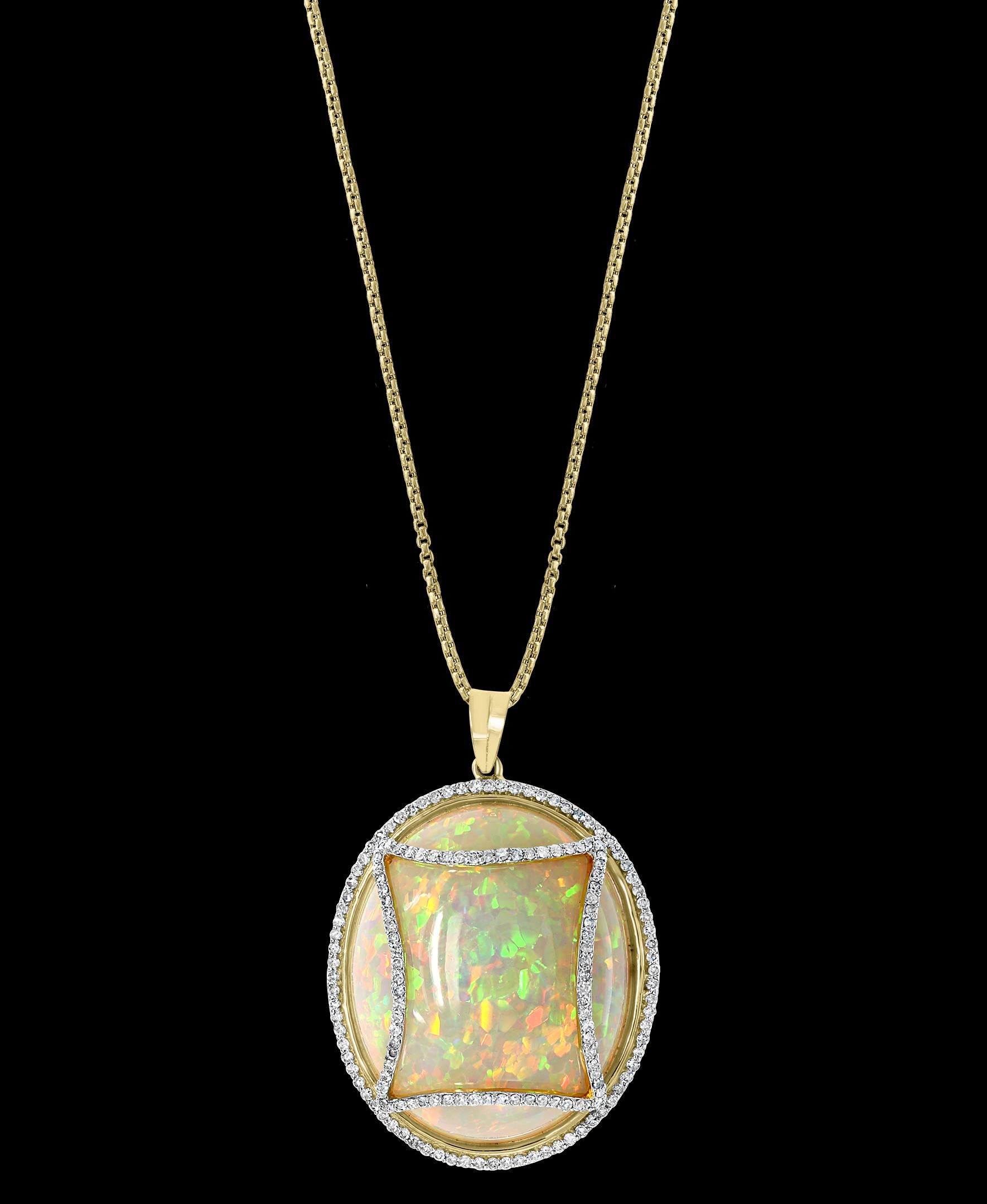  70 Carat  Oval Ethiopian  Opal &  Diamond Pendant /  Necklace 14 K Gold Estate yellow  Gold Estate
This spectacular Pendant Necklace  consisting of a single Oval  Shape Ethiopian  Opal Approximately 70 Carat.  The  Opal   is surrounded by