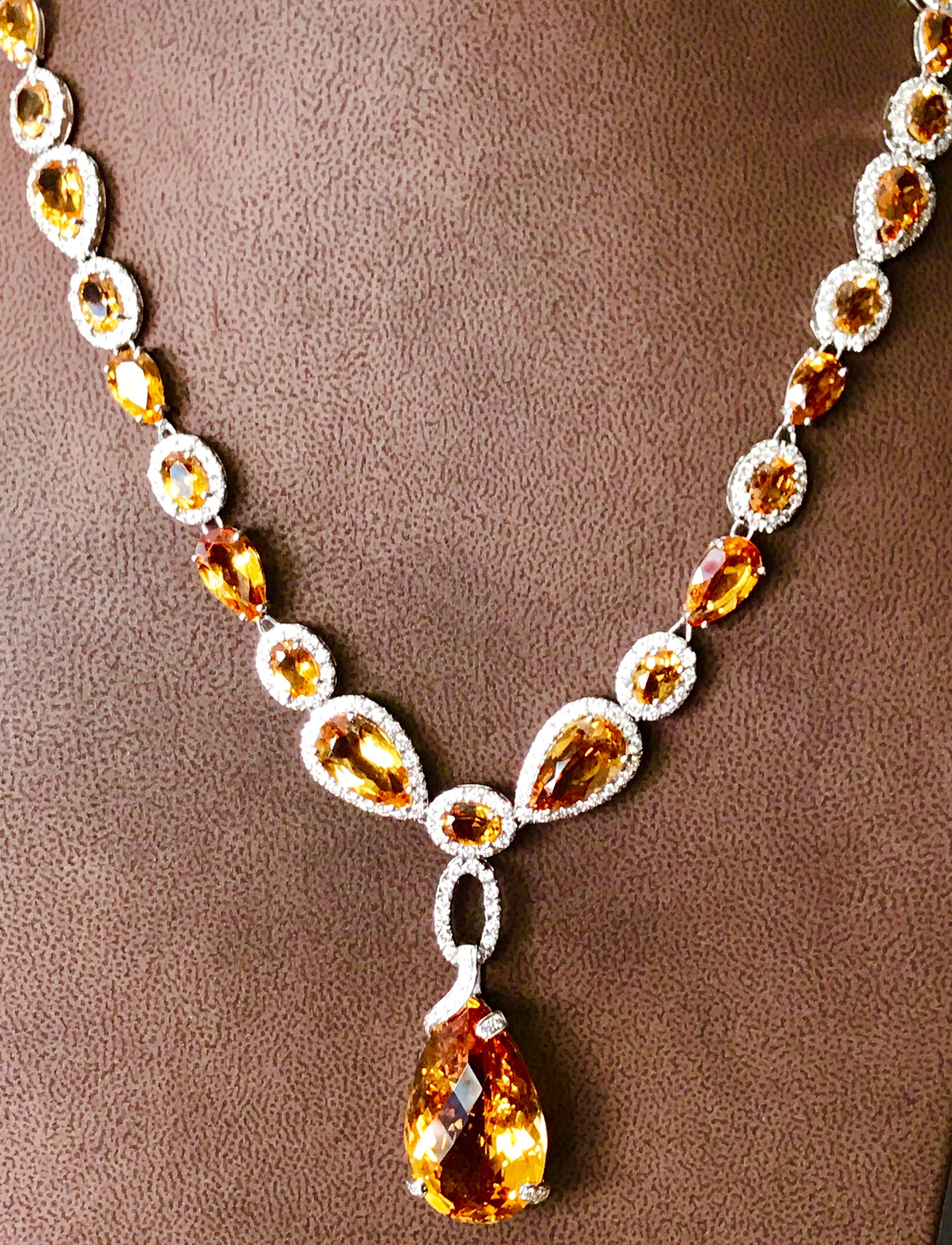 70 Carat Oval & Tear Drop Citrine  & 10 Carat Diamonds Necklace 18 K White Gold 
This extraordinary Necklace is consist  of  Fine oval  and pear shape natural  Citrine  weighing approximately over 70 Carat
  There are  total  of  approximately 10