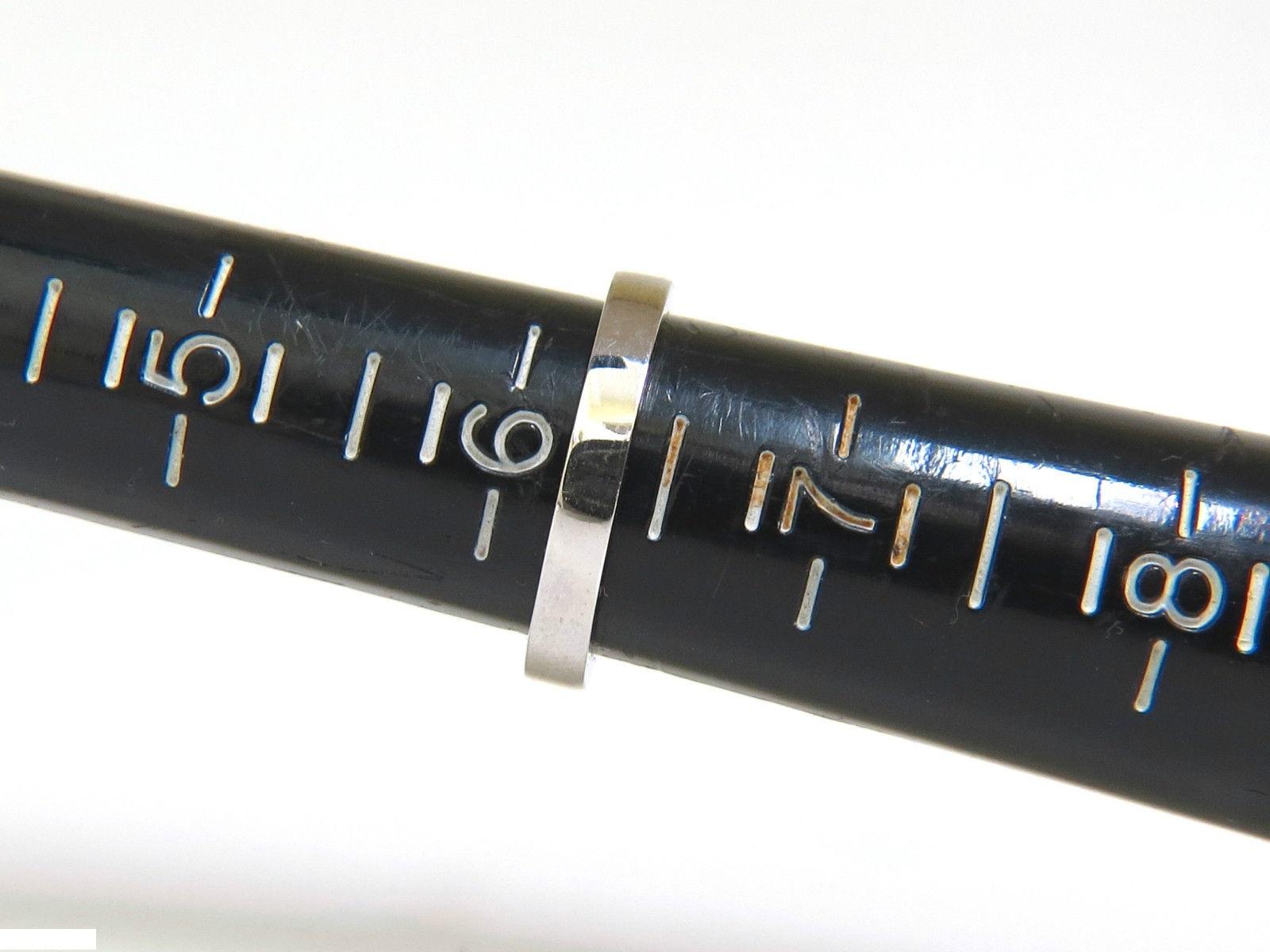 
.70ct. Fascia di diamanti taglio principessa

Colore H, chiarezza Vs-2

Oro bianco 14kt.

2.7 grammi

3,20 mm di larghezza

 dimensione: 6.5

è possibile ridimensionare, si prega di informarsi

La valutazione di 3000 dollari accompagnerà