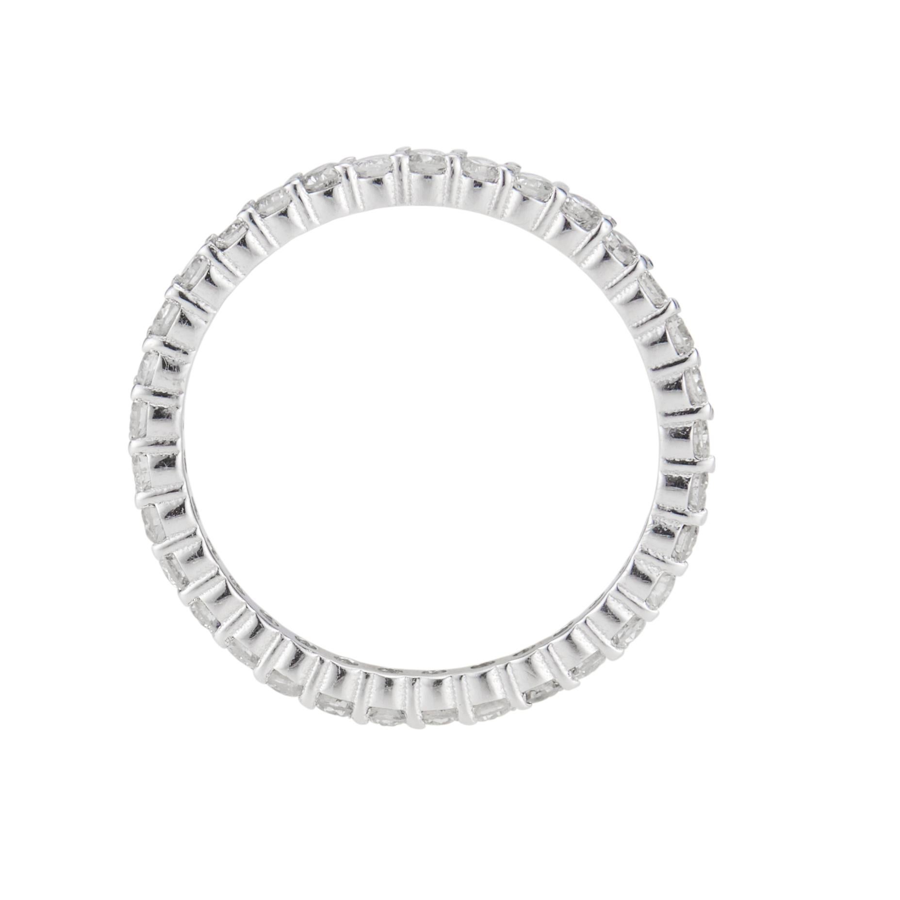 33 round brilliant cut diamond wedding band in a Platinum eternity band setting.  

33 round brilliant cut diamonds, G-H SI approx. .70cts
Size 5.75 and sizable 
Platinum 
2.0 grams
Width at top: 1.8mm
Height at top: 2.0mm
Width at bottom: 1.78
