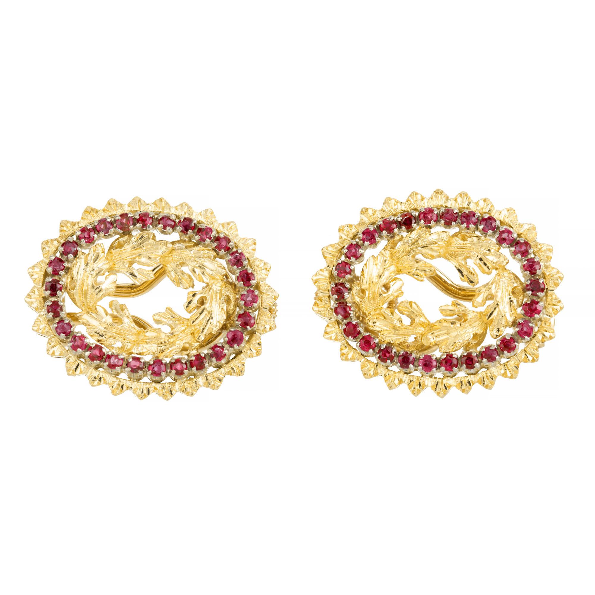  .70 Carat Ruby Yellow Gold Lever Back Earrings, a true testament to beauty and elegance. Crafted with utmost detail, each earring is adorned with 26 round red rubies. In the center are high detailed leaf style designs. The lever back design ensures