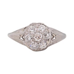 Bague de fiançailles Art déco en platine et or 14 carats avec diamants d'un poids total de 0,70 carat