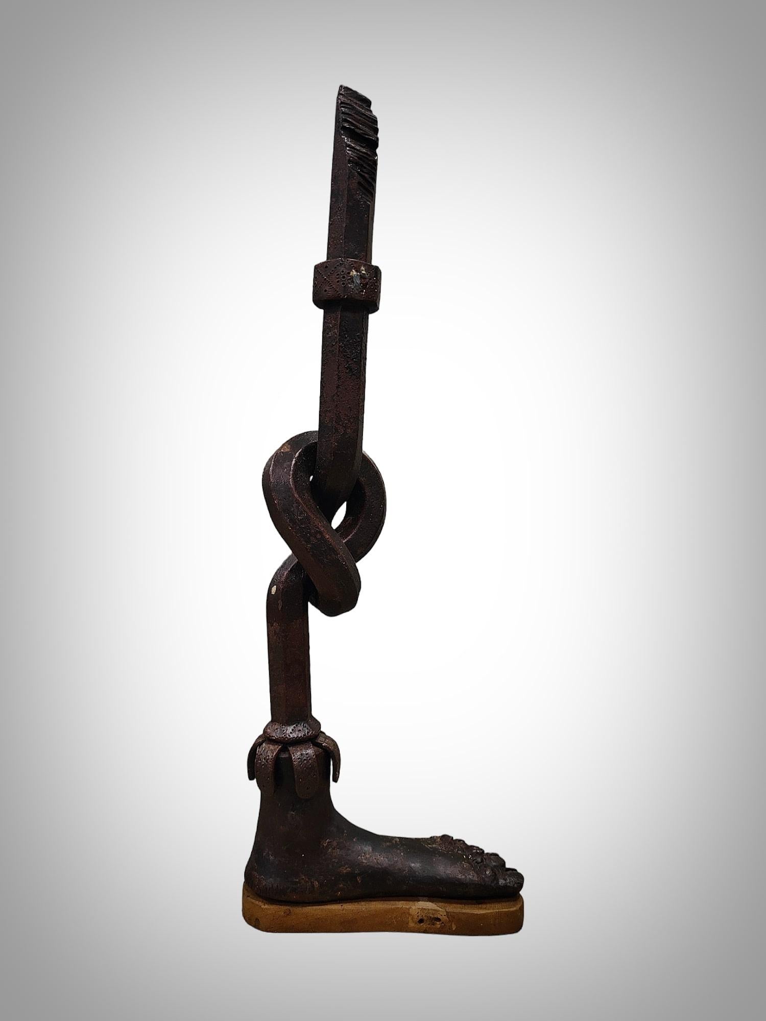 Introducing an elegant forged iron sculpture, meticulously crafted by a master blacksmith at the forge. This work, executed with various techniques of hot ironwork, reflects the artisanal skill and technical mastery of its creator. Measuring 70x22x9