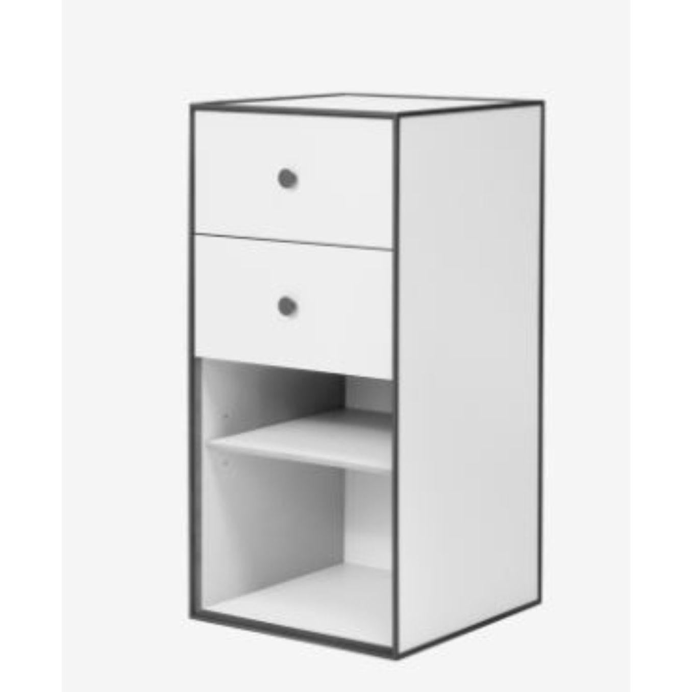 70 white frame box with shelf / 2 drawers by Lassen
Dimensions: D 35 x W 35 x H 70 cm 
Materials: Finér, melamin, melamin, melamine, metal, veneer
Also available in different colours and dimensions. 
Weight: 13 kg.


By Lassen is a Danish