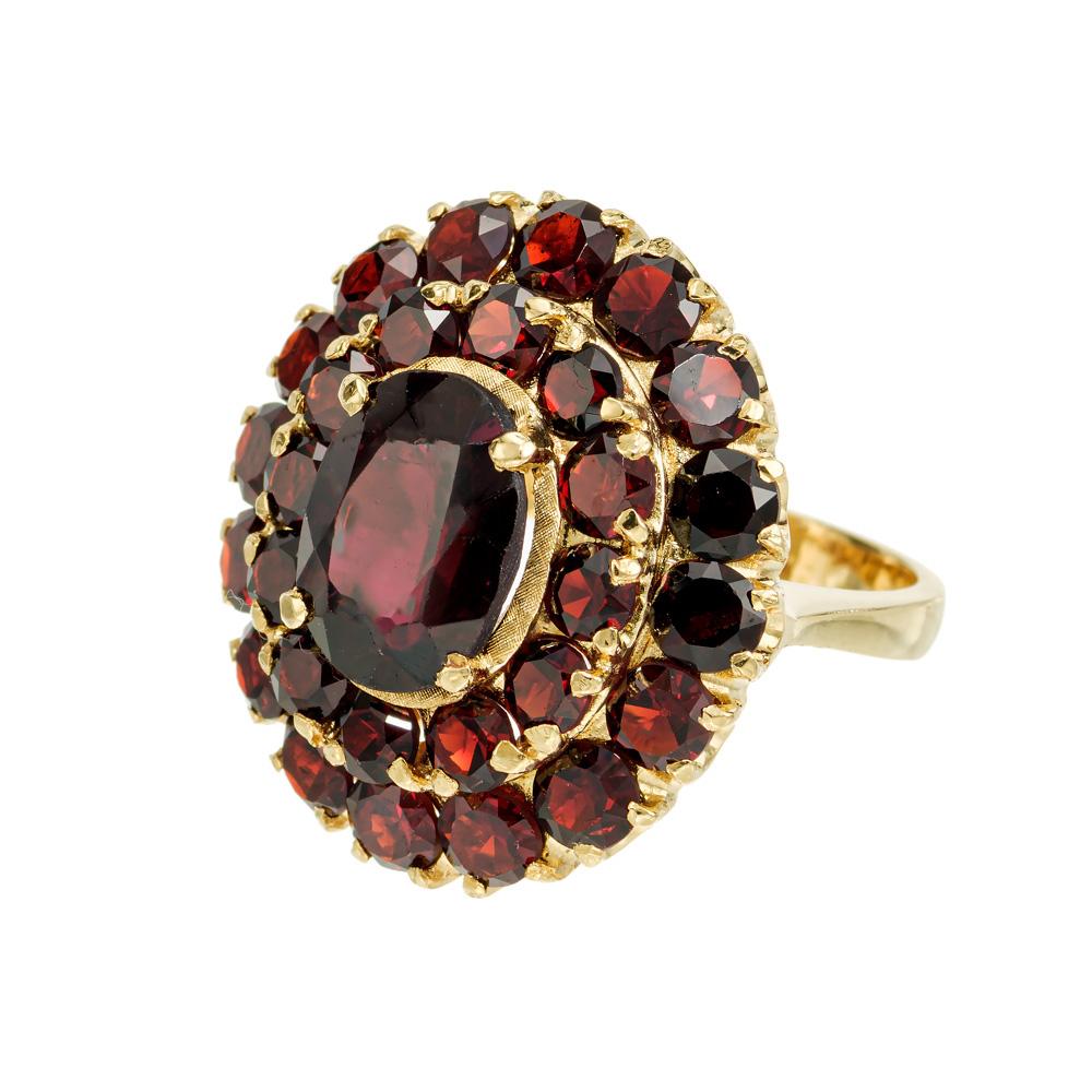 Oval Cut 7.00 Carat Garnet Yellow Gold Cluster Cocktail Ring For Sale