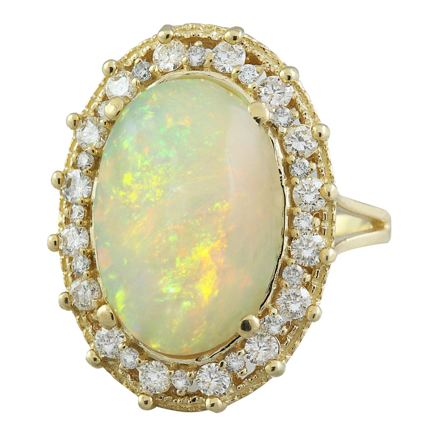 7.00 Carat Natural Opal 14 Karat Solid Yellow Gold Diamond Ring
Stamped: 14K 
Ring Size: 7 
Total Ring Weight: 9.4 Grams 
Opal  Weight: 6.00 Carat (17.00x12.00 Millimeter)
Diamond Weight: 1.00 Carat (F-G Color, VS2-SI1 Clarity)
Quantity: 32
Face