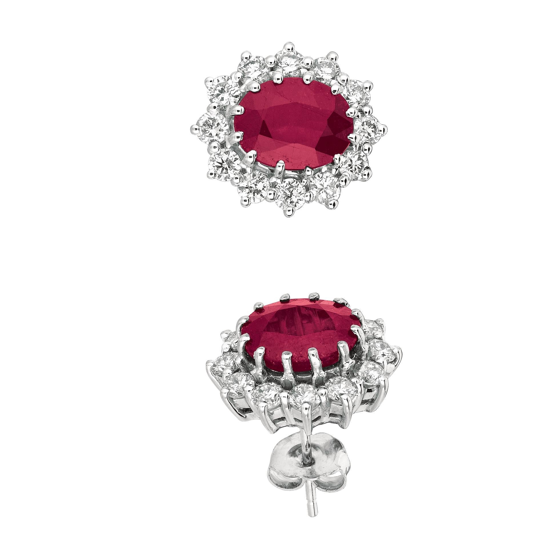 
7.00 Carat Natural Diamond and Ruby Earrings G SI 14K White Gold

    100% Natural Diamonds and Rubies
    7.00CT
    Color G-H 
    Clarity SI  
    14K White Gold  4.9 grams, Prong style 
    9/16 inch in height, 1/2 inch in width
    24 diamonds