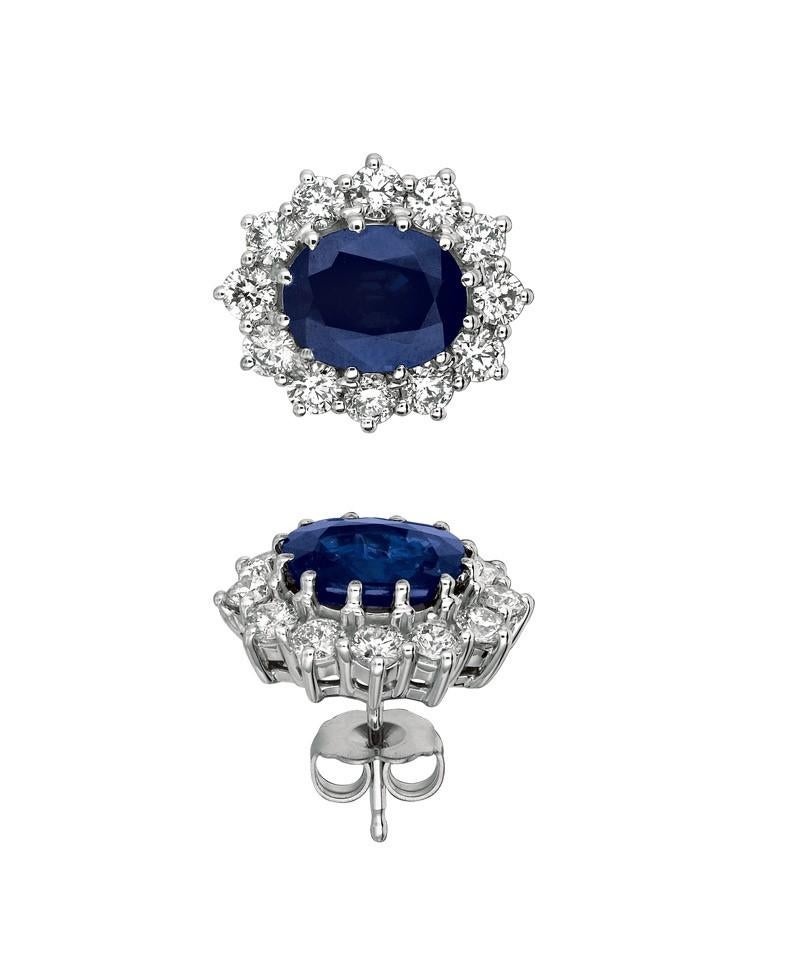 
7.03 Carat Natural Diamond and Sapphire Earrings G SI 14K White Gold

    100% Natural Diamonds and Sapphires
    7.03CT
    G-H 
    SI  
    14K White Gold  4.9 grams, Prong style 
    9/16 inch in height, 1/2 inch in width
    24 diamonds  -