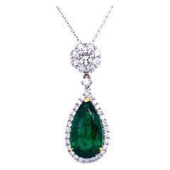 7.00 Carat Pear Shape Emerald Pendant in 18K Gold with 1.85 Carat Diamonds Halo