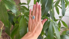 7.00 Carat Swiss Blue Topaz Diamond 14 Karat Yellow Gold Swirl Halo Ring