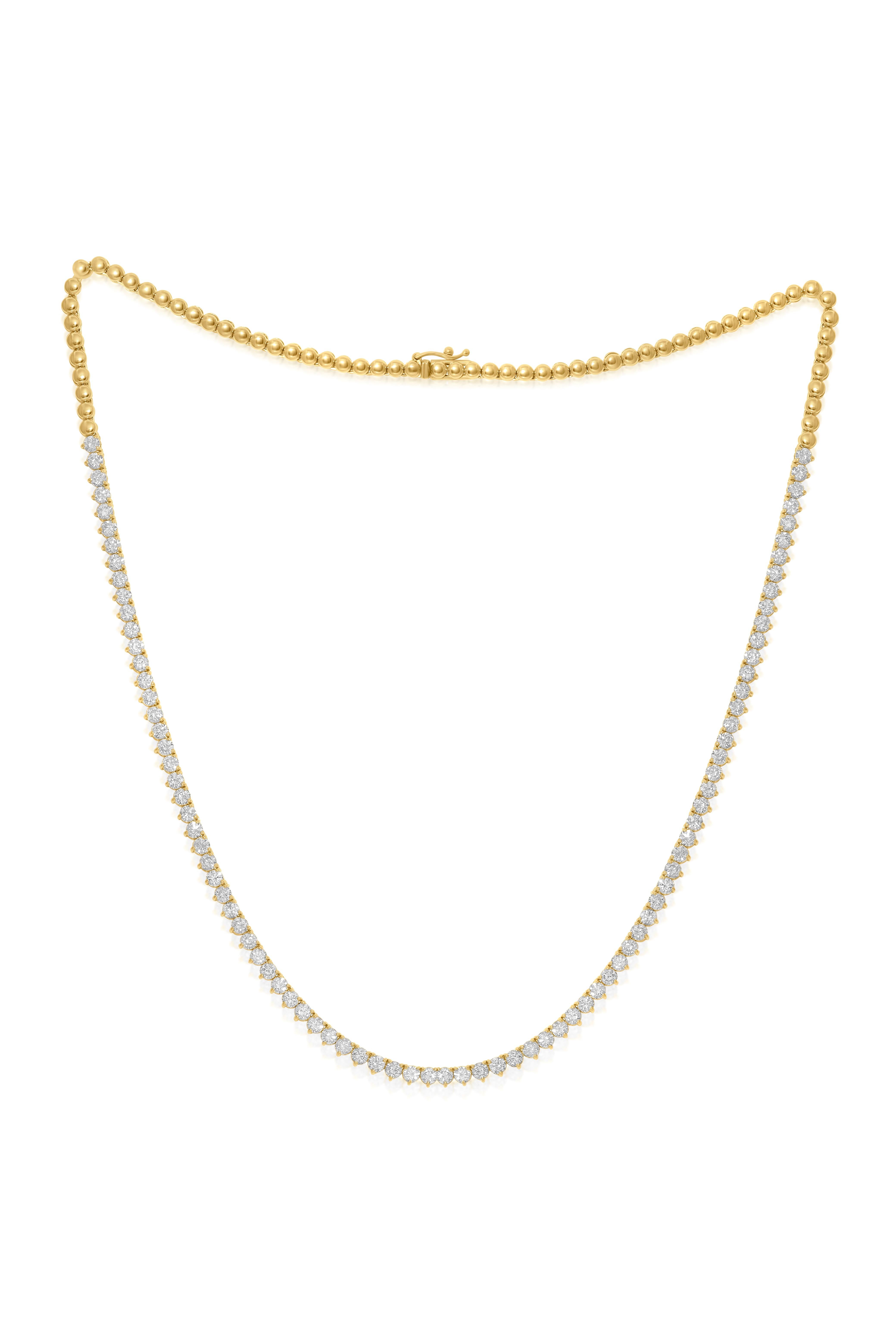 14K Yellow Gold Half Way Diamond Tennis necklace, features 7.00 carats of diamonds, set in yellow gold 3 prong mounting with 88 stones 
G-H in Color SI in Clarity 

