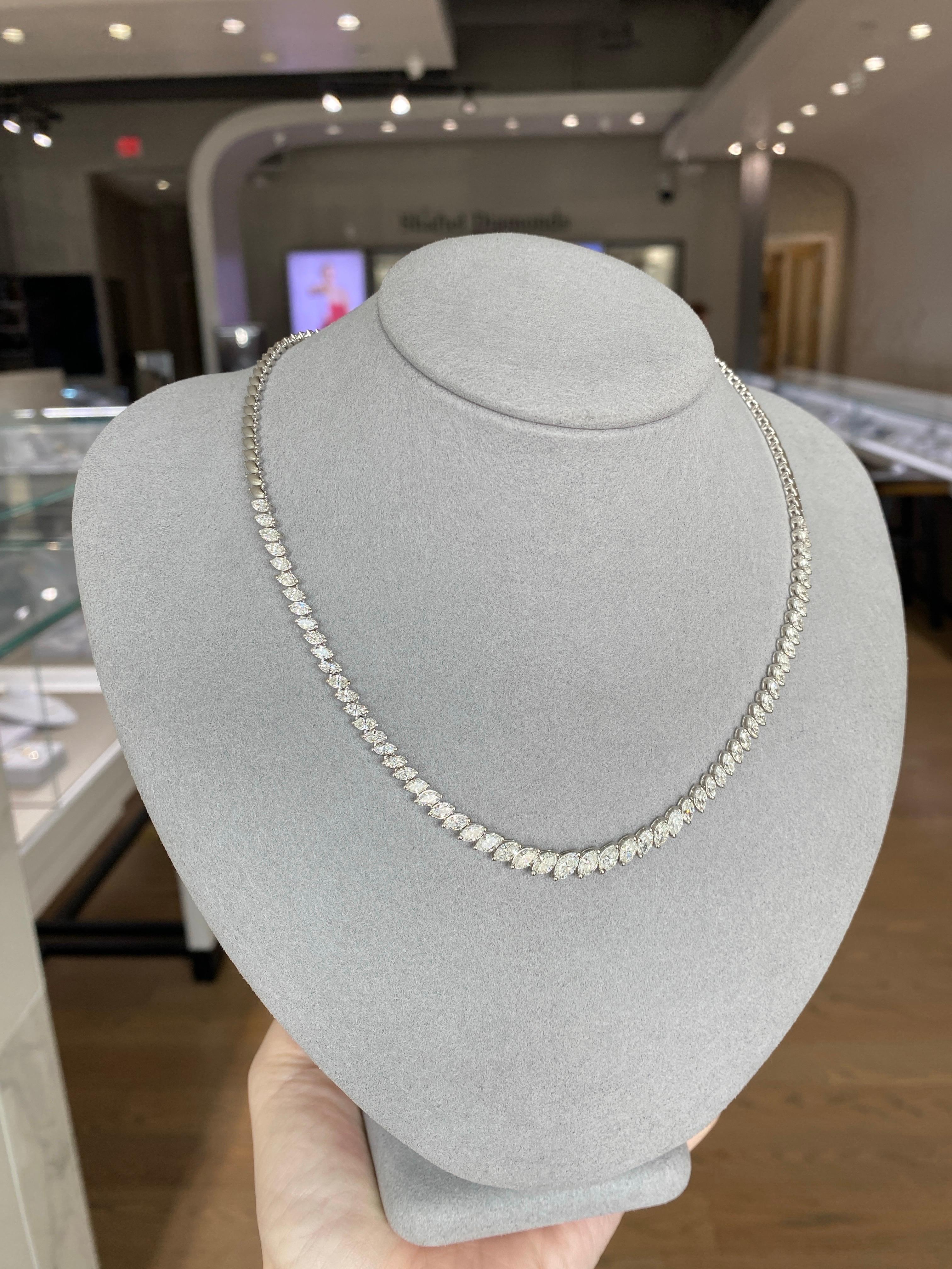 Erhöhen Sie Ihren Stil mit dieser eleganten Halskette aus 14 Karat Weißgold mit 7,00 Karat exquisiten natürlichen birnenförmigen Diamanten.  Mit 59 sorgfältig gefassten, schillernden Steinen ist dieses Schmuckstück perfekt, um jedem Outfit einen