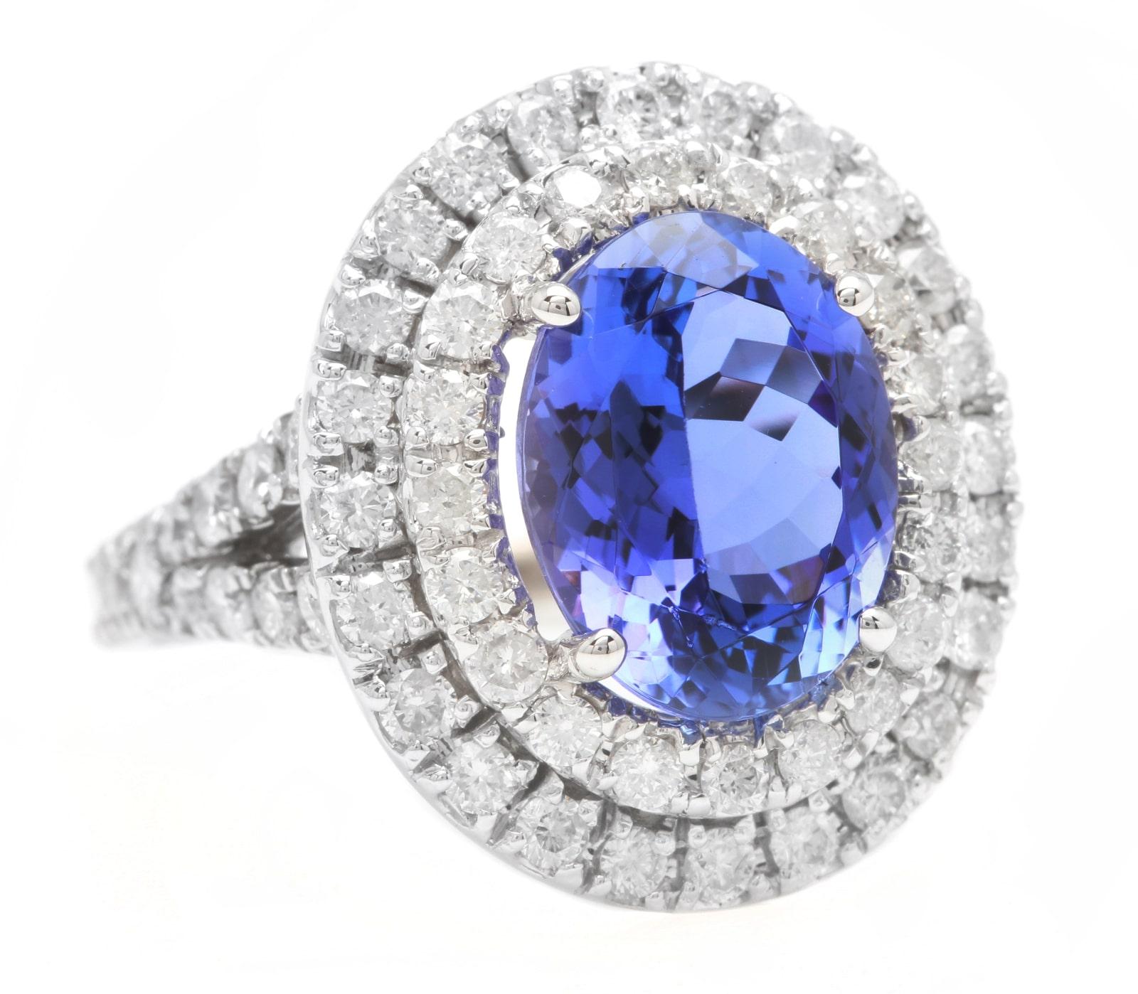 7.00 Carats Natural Very Nice Looking Tanzanite and Diamond 14K Solid White Gold Ring

Suggested Replacement Value:  $8,000.00

Total Natural Oval Cut Tanzanite Weight is: Approx. 5.00 Carats 

Tanzanite Measures: Approx. 12.00 x 9.00mm
 
Natural