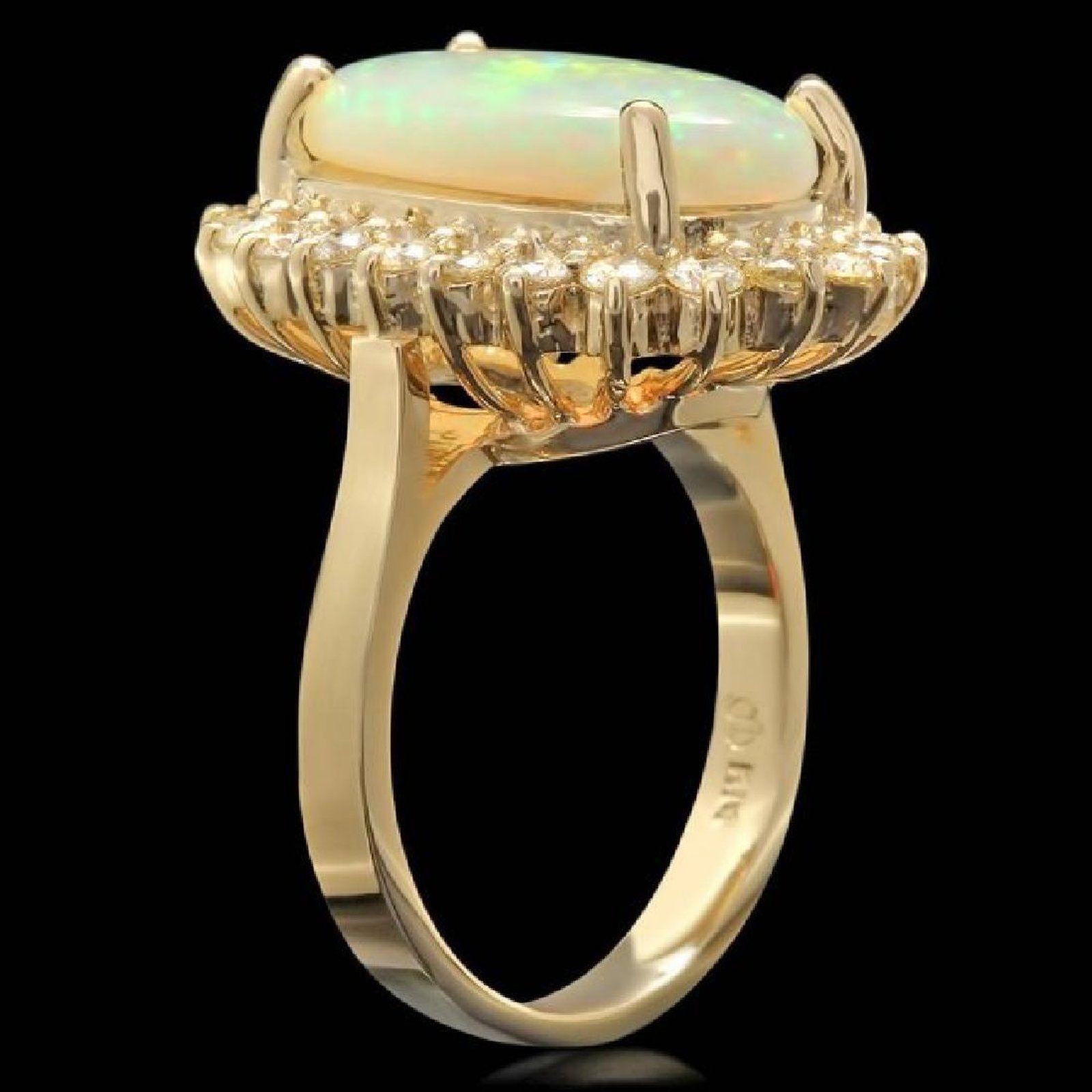 7.00 Carats Natural Impressive Australian Opal and Diamond 14K Solid Yellow Gold Ring

The opal has beautiful fire, pictures don't show the whole beauty of the opal!

Total Natural Opal Weight is: Approx. 6.00 Carats

Opal Measures: 16.00x
