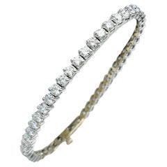 Bracciale tennis con diamanti tondi e brillanti da 7,00 carati totali in oro bianco da 18 carati