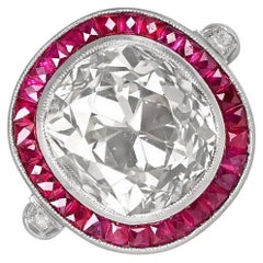 Bague de fiançailles ancienne avec diamant taille coussin de 7,00 carats, halo de rubis et platine