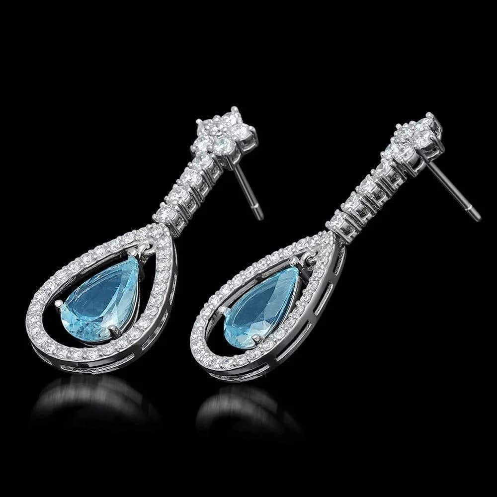 7.00Ct Natural Aquamarine and Diamond 14K Solid White Gold Earrings

Total Natural Diamonds Weight: 2.60 Carats (color G-H / Clarity SI1-SI2)

Total Natural Pear Shaped Blue Aquamarines Weight is: 4.40 Carats

Aquamarine Measure: 12 x 8mm

Total