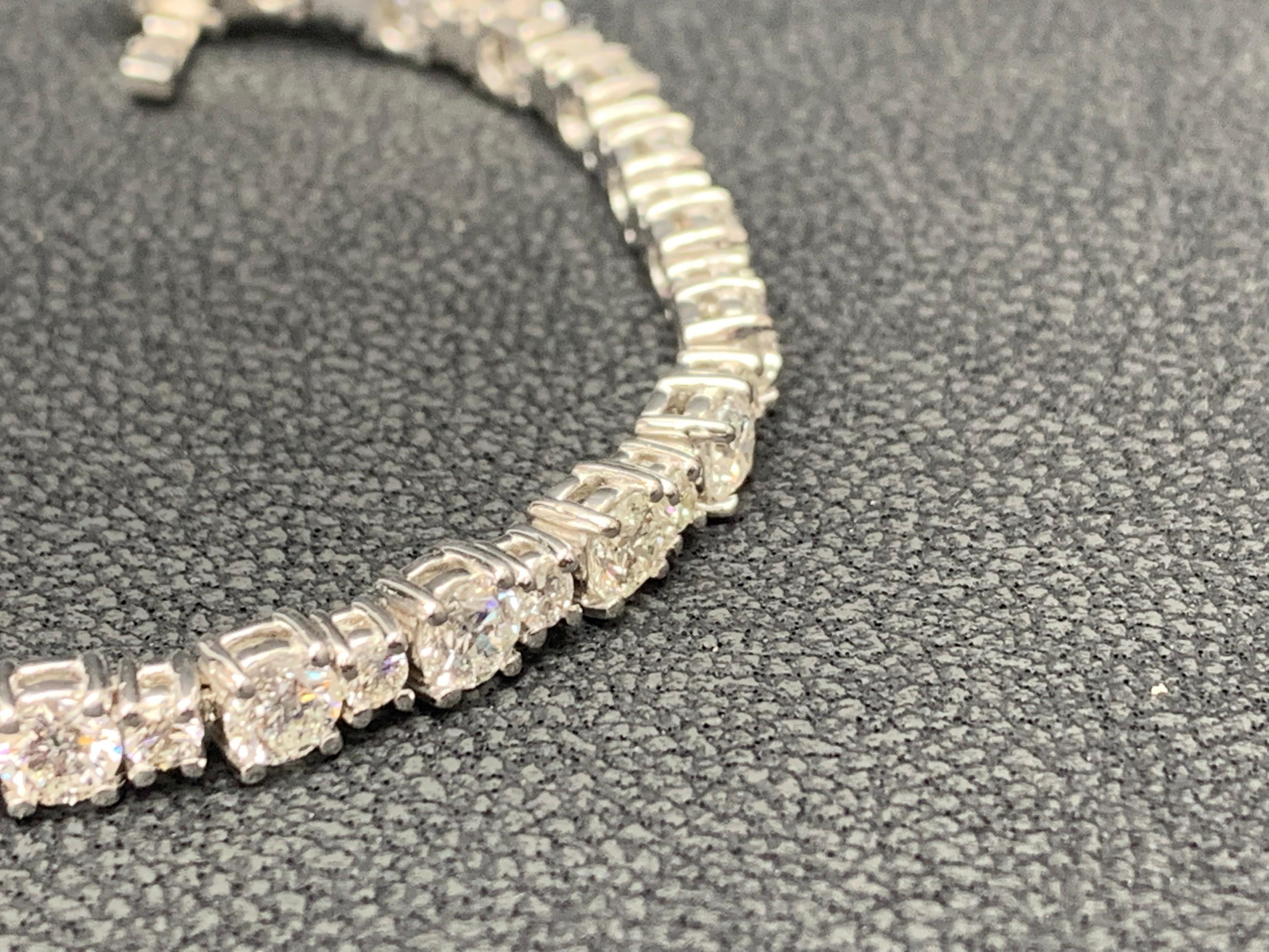 Bracelet tennis en or blanc 14 carats avec diamants taille brillant de 7,01 carats en vente 8