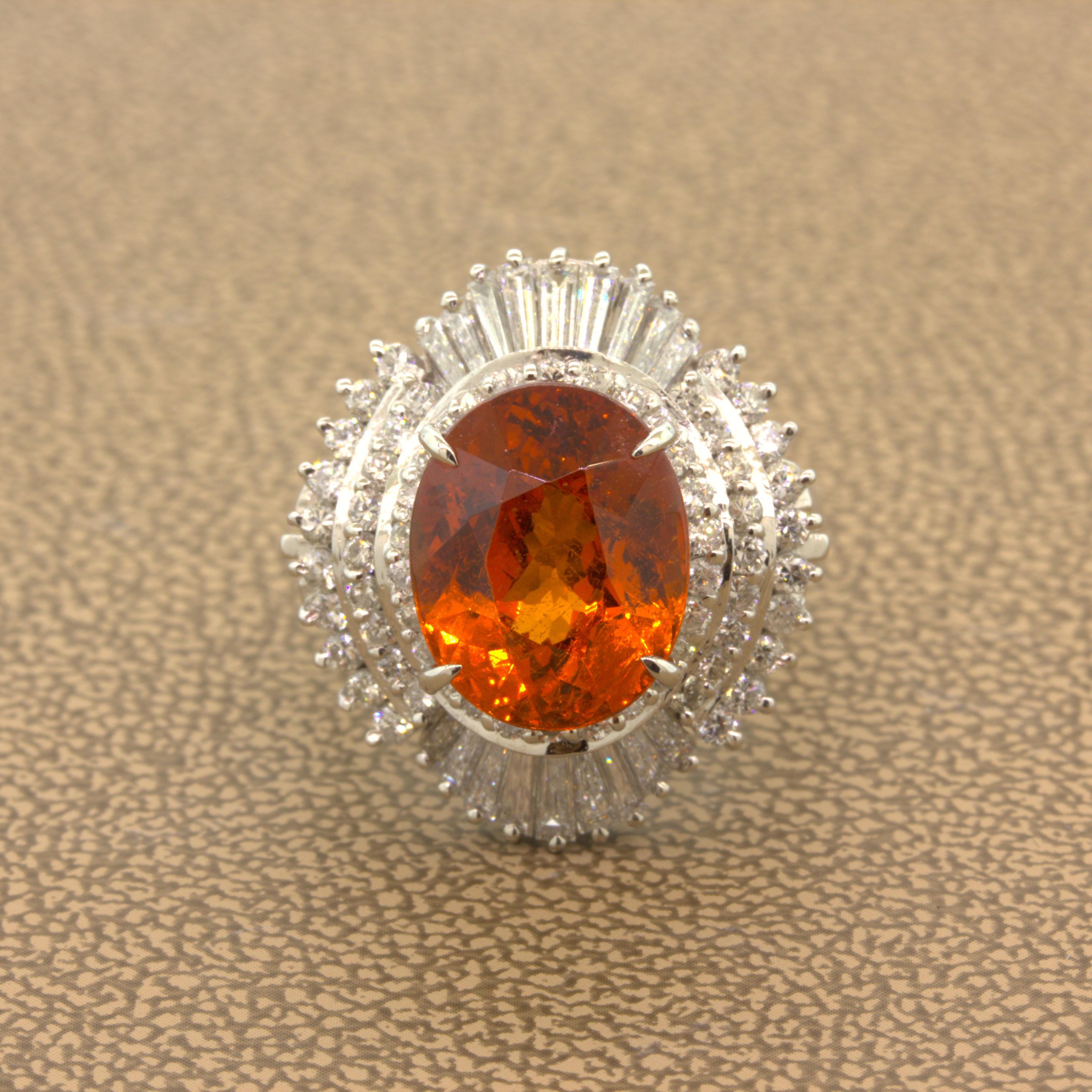 A richly colored juicy mandarin garnet takes center stage. It weighs 7.01 carats and has a super-rich and bright vivid orange color that simply pops! No other gemstone comes close to the intense pure orange color of mandarin garnets. There are 1.55