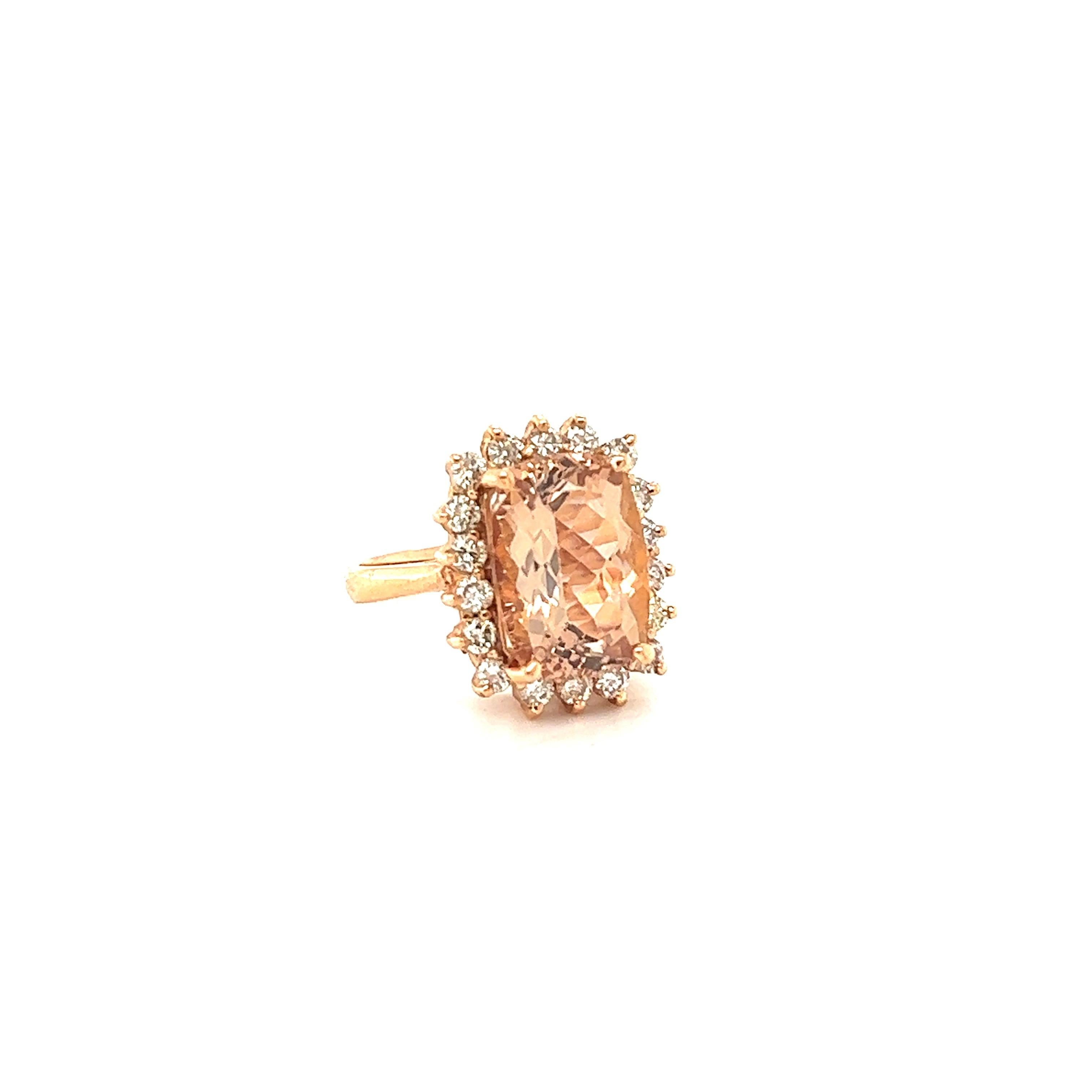 Statement Morganite Diamond Ring! 

This ring has a 6.19 Carat Natural Emerald Cut Morganite that measures at 13 mm x 10 mm and is surrounded by 18 Round Cut Diamonds that weigh 0.82 Carats. The total carat weight of the ring is 7.01 Carats.  

The