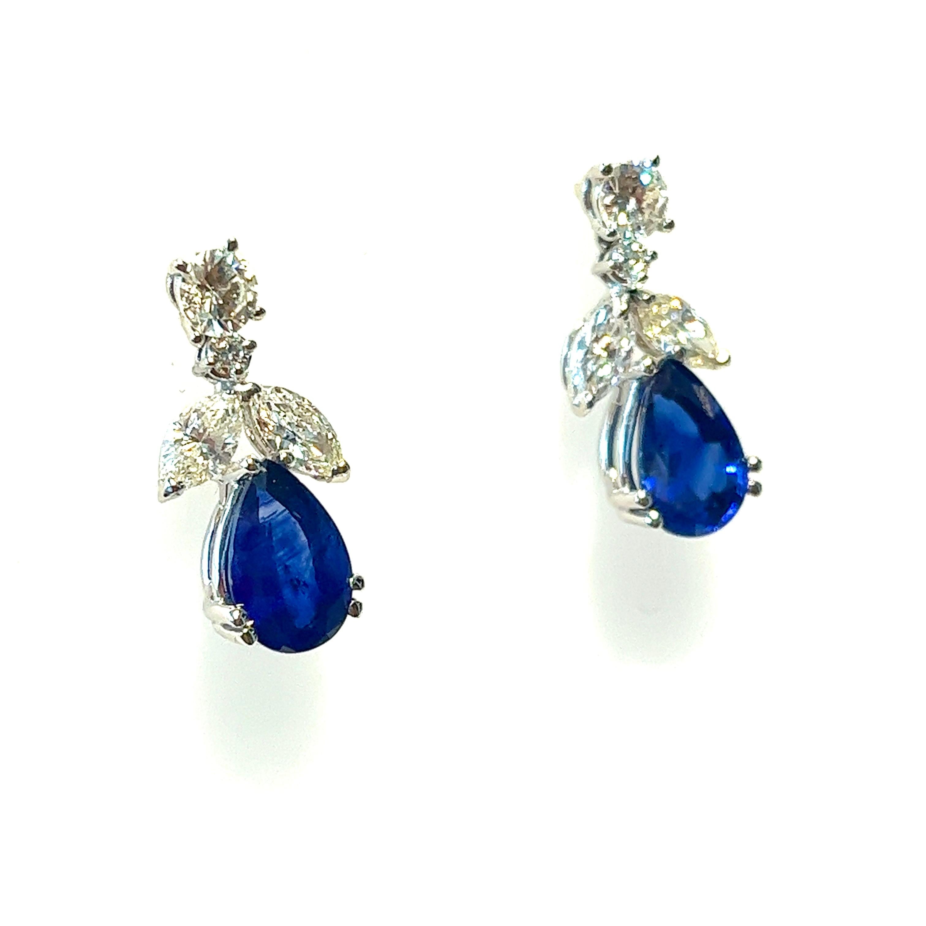 Pear Cut 7.01 carat Pear Shape Sapphire and Diamond Earrings, 18kt  For Sale
