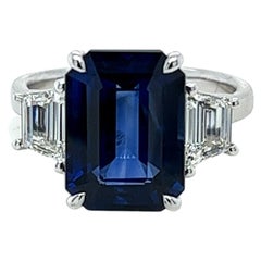 7.02 Carat Emerald Cut Ceylon Sapphire 
Diamond Three Stone Ring in Platinum