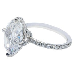 7.02 Carat Oval Diamond Ring Brilliant White 18K Gold Signature Sophistication