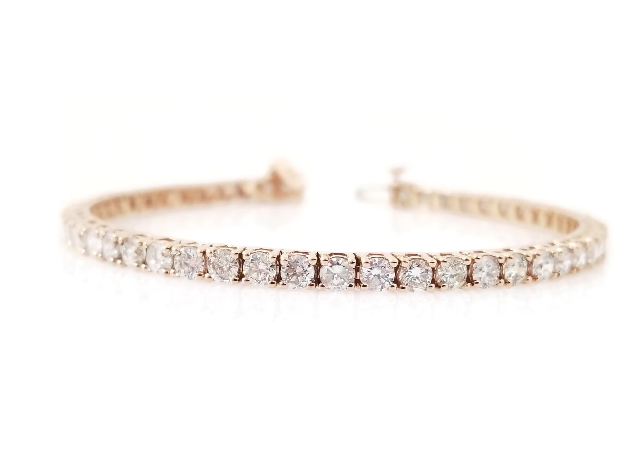 Quality tennis bracelet, natural round-brilliant cut white diamonds clean and Excellent shine. 14k Rose gold classic four-prong style for maximum light brilliance.
 
Length 7 Inch
Average Color H
Average Clarity SI 
Size 3.8 mm Wide