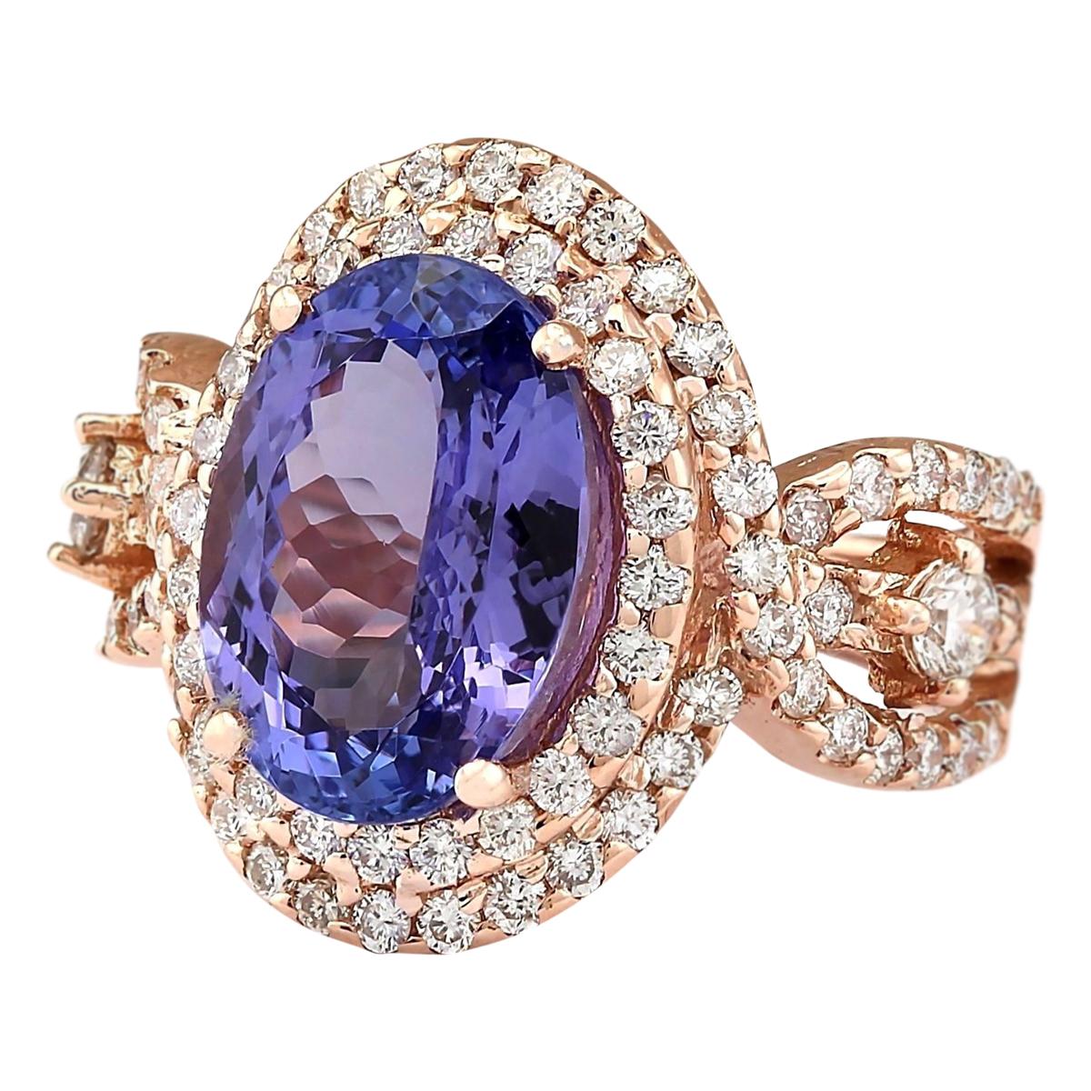 7.02 Carat Tanzanite 14 Karat Rose Gold Diamond Ring
Stamped: 14K Rose Gold
Total Ring Weight: 8.1 Grams
Total  Tanzanite Weight is 5.81 Carat (Measures: 12.00x10.00 mm)
Color: Blue
Total  Diamond Weight is 1.21 Carat
Color: F-G, Clarity: