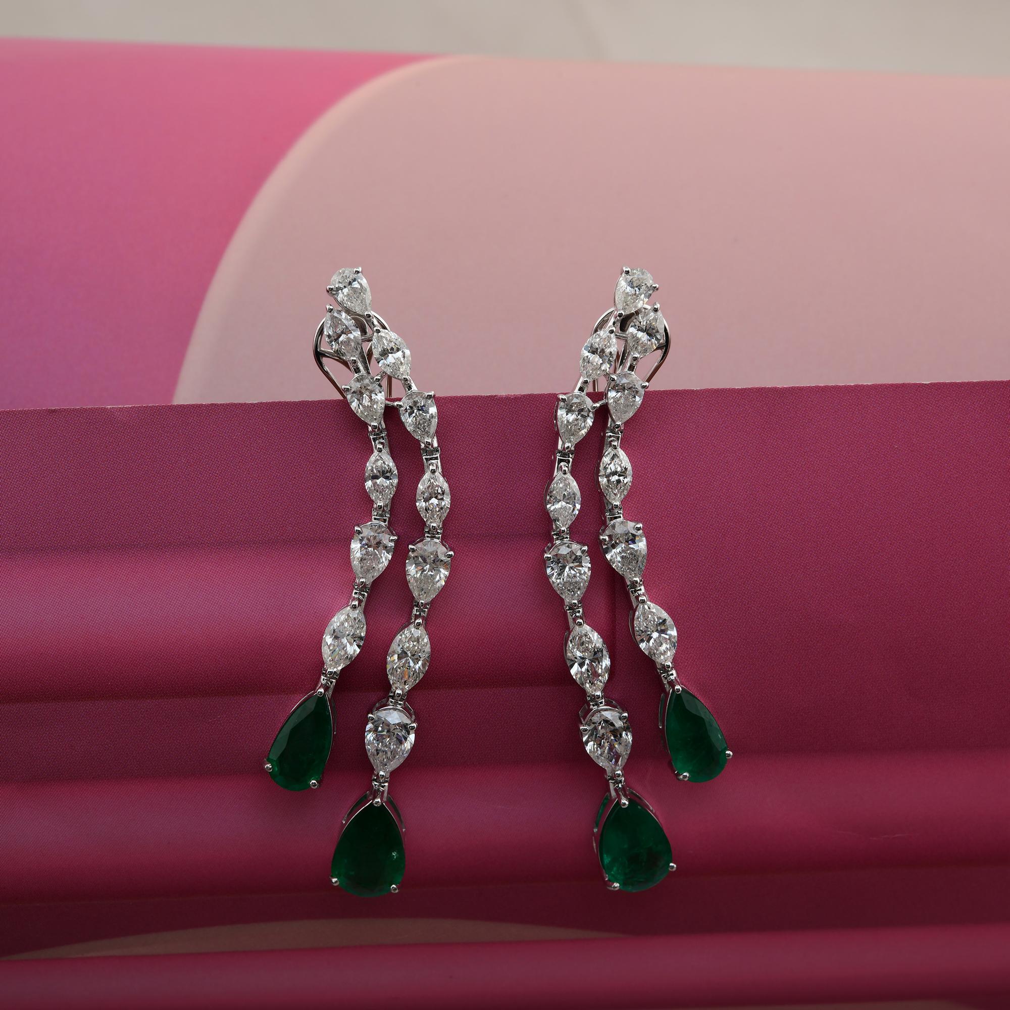 Diese exquisiten Ohrringe aus 14-karätigem Gold sind mit einem sambischen Smaragd von 7,02 Karat und funkelnden Diamanten von 8,51 Karat besetzt.

FOLLOW SPECTRUM JEWELS Storefront, um die neueste Collection'S und exklusive Stücke zu sehen. Spectrum