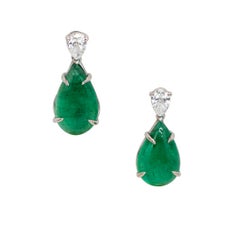 7.02 Carats Pear Shaped Emerald and Pear Shaped Diamond Earrings in Platinum