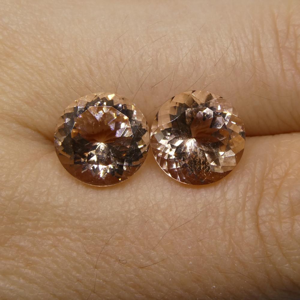 Description:

Gem Type: Morganite 
Number of Stones: 2
Weight: 7.03 cts
Measurements: 9.90x9.87x6.62mm /9.85x9.79x6.59 mm
Shape: Round
Cutting Style Crown: Modified Brilliant Cut
Cutting Style Pavilion: Mixed Cut 
Transparency: Transparent
Clarity: