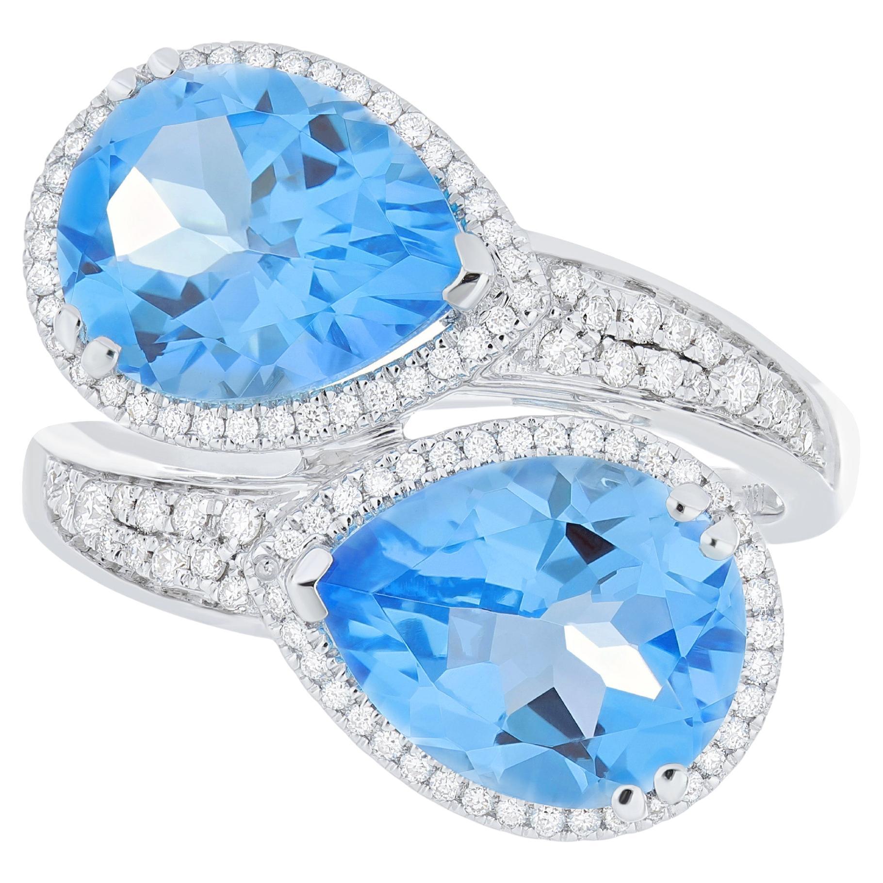 7.03 CT's Swiss Blue Topaz and Daimond Ring in 18K White Gold