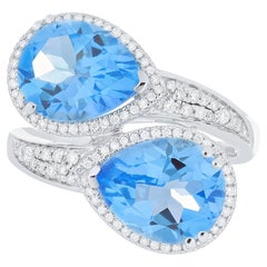 7.03 CT's Swiss Blue Topaz and Daimond Ring in 18K White Gold