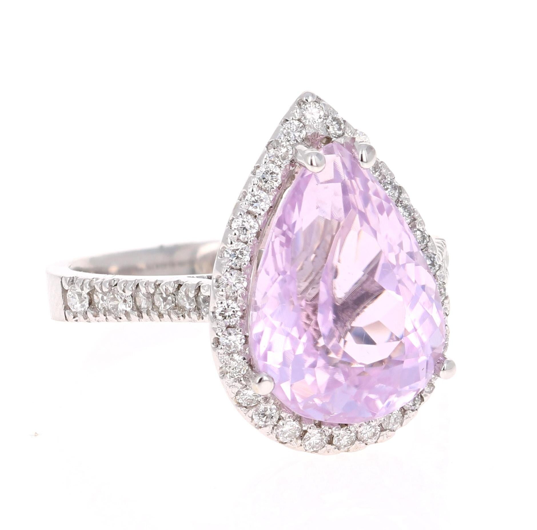 A lovely Engagement Ring Option or as an alternate to a Pink Diamond Ring! This simply stunning Kunzite Diamond Ring has a 6.54 Carat Pear Cut Kunzite as its center and has a beautiful simple halo of 44 Round Cut Diamonds that weigh 0.50 carats