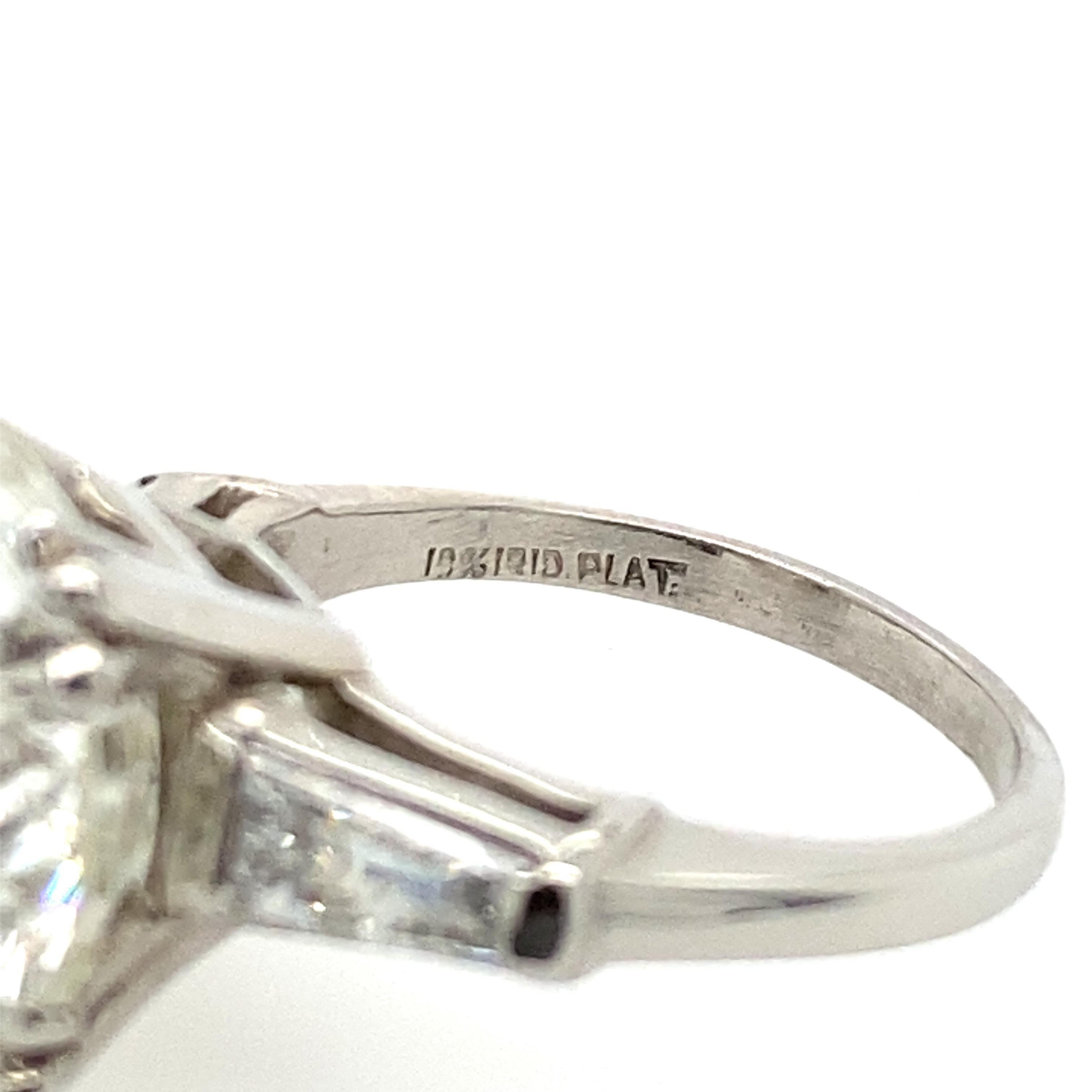 round diamond with tapered baguettes