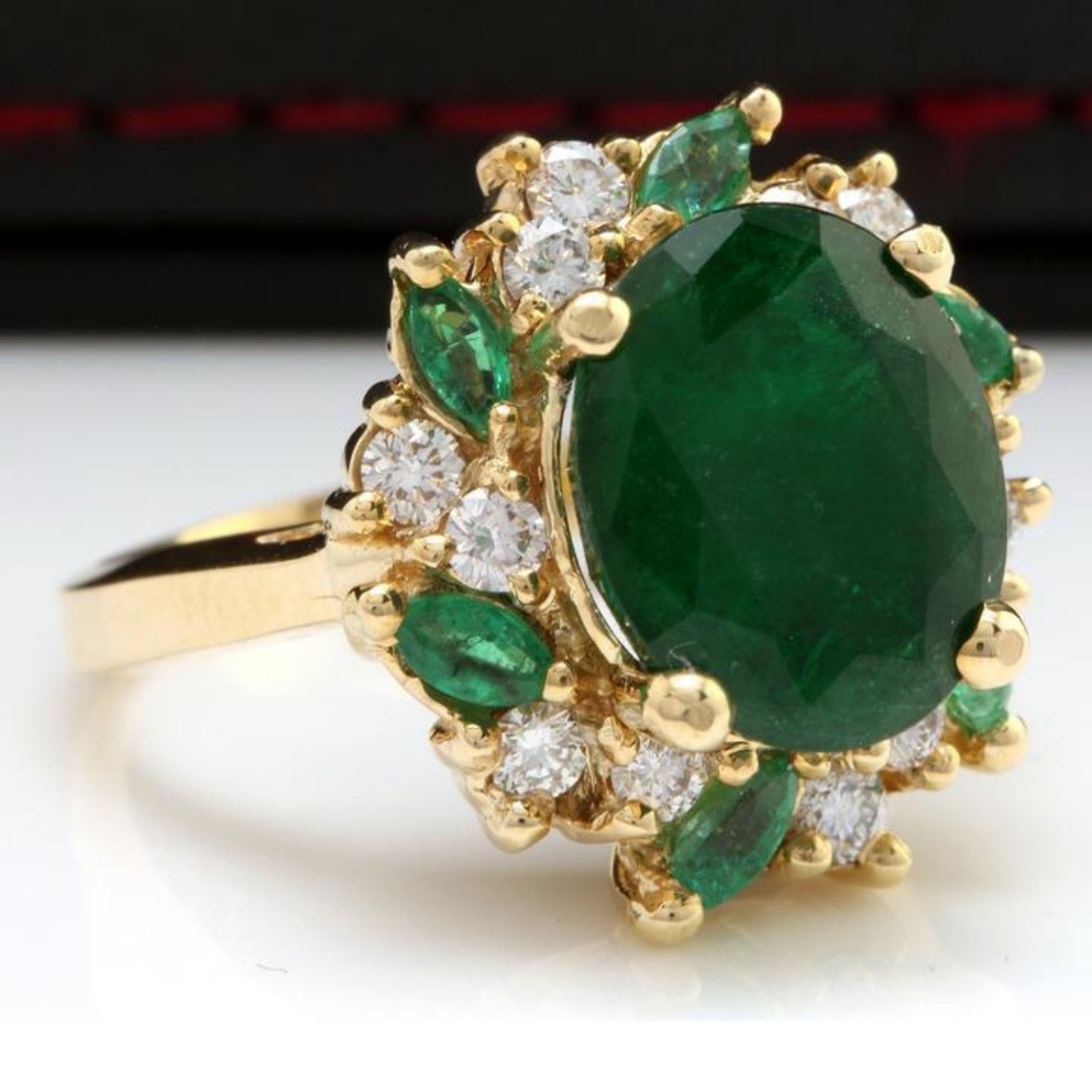 7.04 Carats Natural Emerald and Diamond 14K Solid Yellow Gold Ring

Total Natural Green Emeralds Weight is: Approx. 6.17 Carats

Center Emerald Cut Emerald Weight is: Approx. 5.42Ct

Total Side Marquise Cut Emeralds Weight is: Approx. 0.75Ct

Center