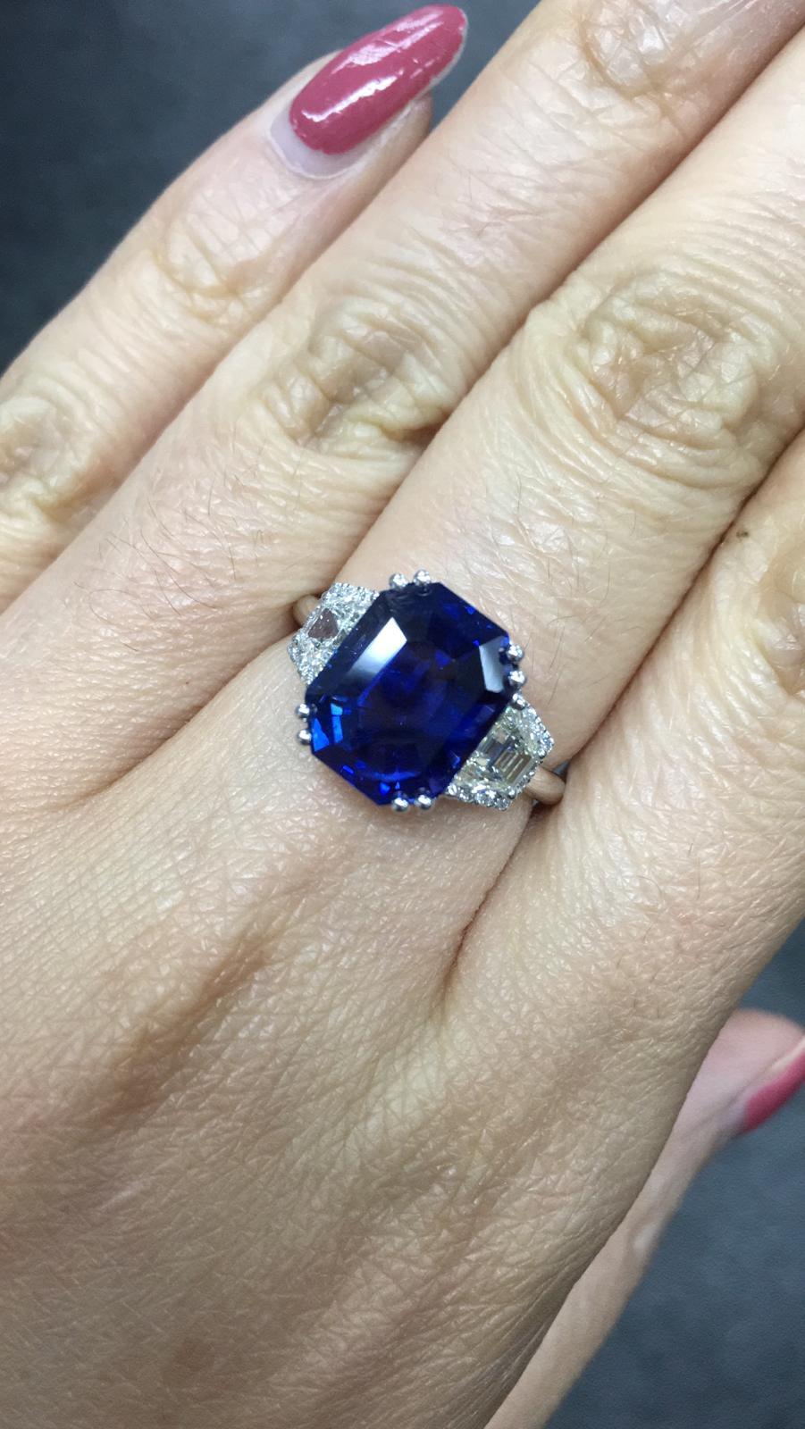 Primary Stone: Sapphire ( Sri Lanka ) Royal Blue 
Shape : Octagonal Cut
Sapphire Weight: 7.05 Carats 
Measurements Sapphire: 11.10mm x 8.80mm x 7.52mm
Color: Royal Blue
Accent Stones: Genuine Diamond
Shape Or Cut Diamond: 2 Baguettes
Average