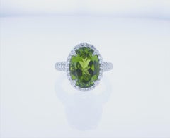 7.05 Carat Oval Peridot Cocktail Ring in 18k White Gold with Palladium
