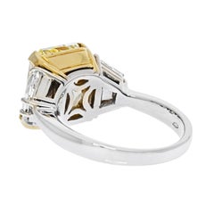 7.05 Carat Radiant Cut Fancy Yellow GIA VS2 Three Stone Diamond Engagement Ring