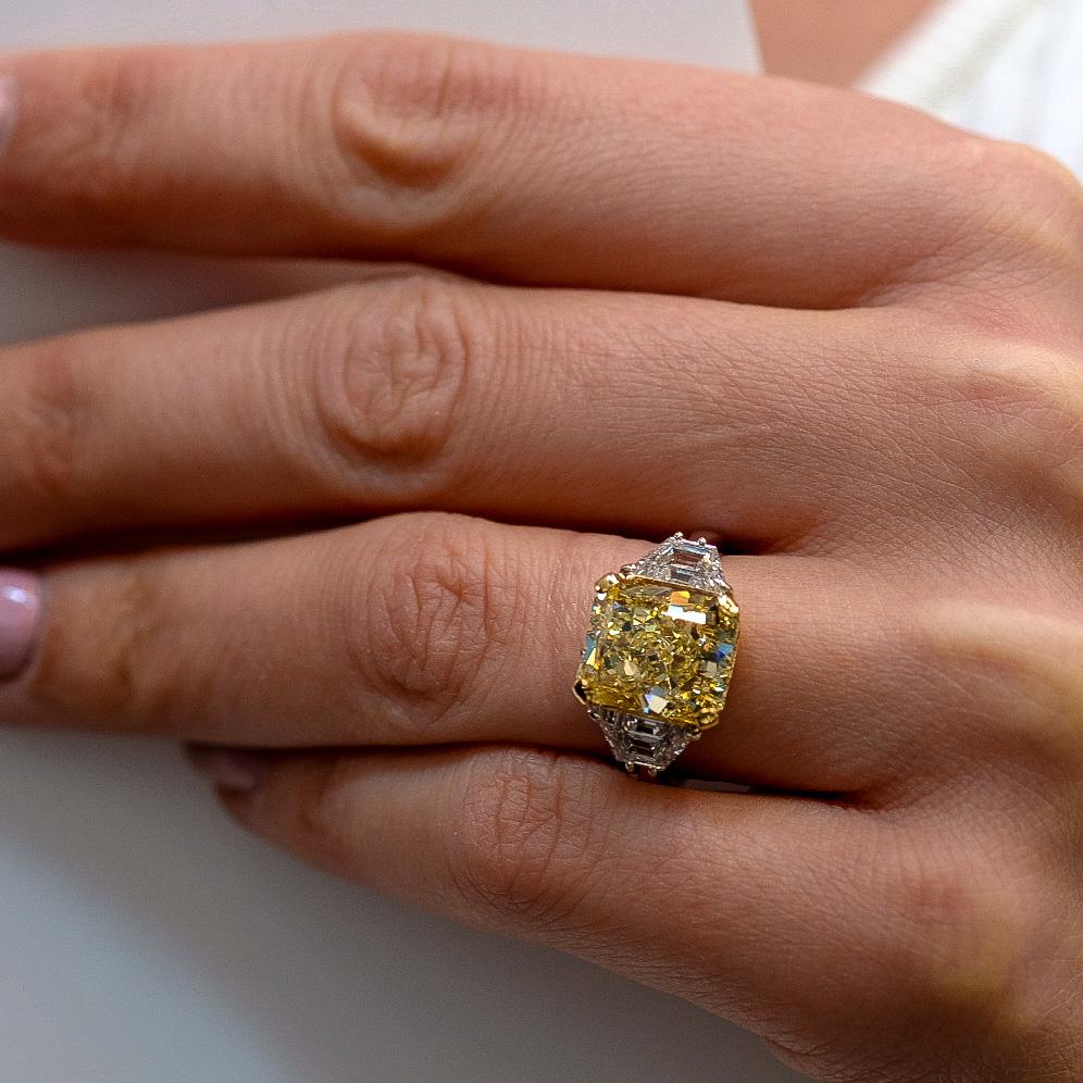 Modern 7.05 Carat Radiant Cut Fancy Yellow GIA VS2 Three Stone Diamond Engagement Ring For Sale