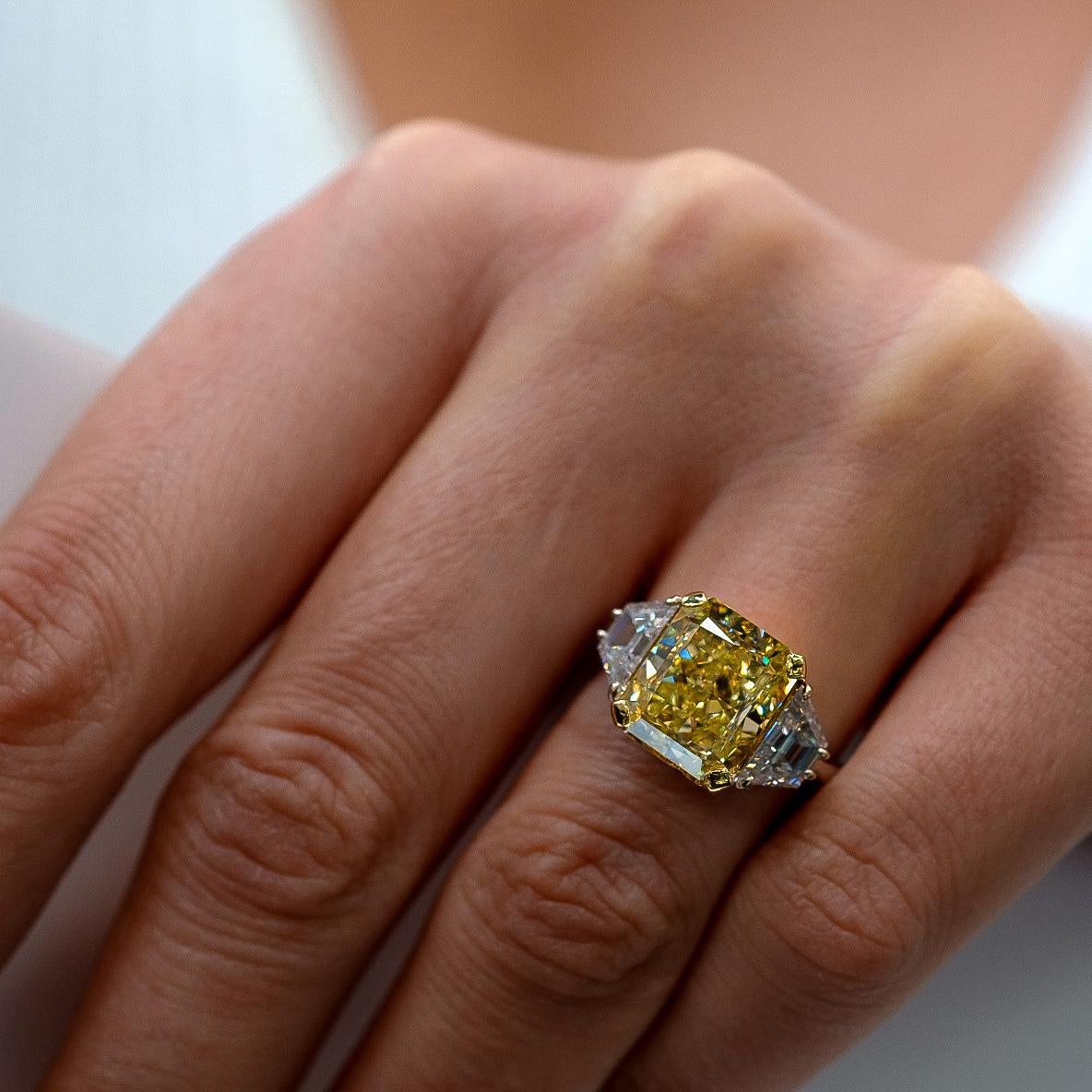 Women's 7.05 Carat Radiant Cut Fancy Yellow GIA VS2 Three Stone Diamond Engagement Ring For Sale
