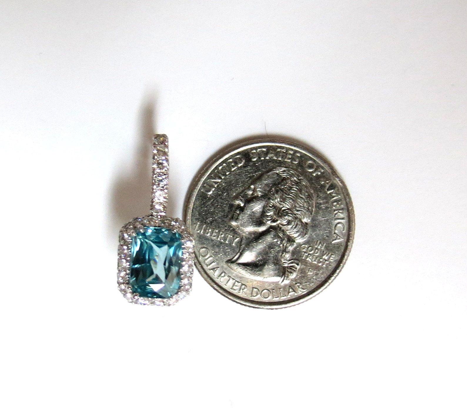 Leverback & Halo

5.75ct. Natural Blue Zircons & 

1.30ct. Natural Diamond earrings.

Blue Zircons of brilliant radiant cuts.

Clean clarity and transparent.

The Prime Indigo colors.

9.4 x 5.9mm

Diamonds: 1.30ct.

Rounds, full cuts.

G-color Vs-2