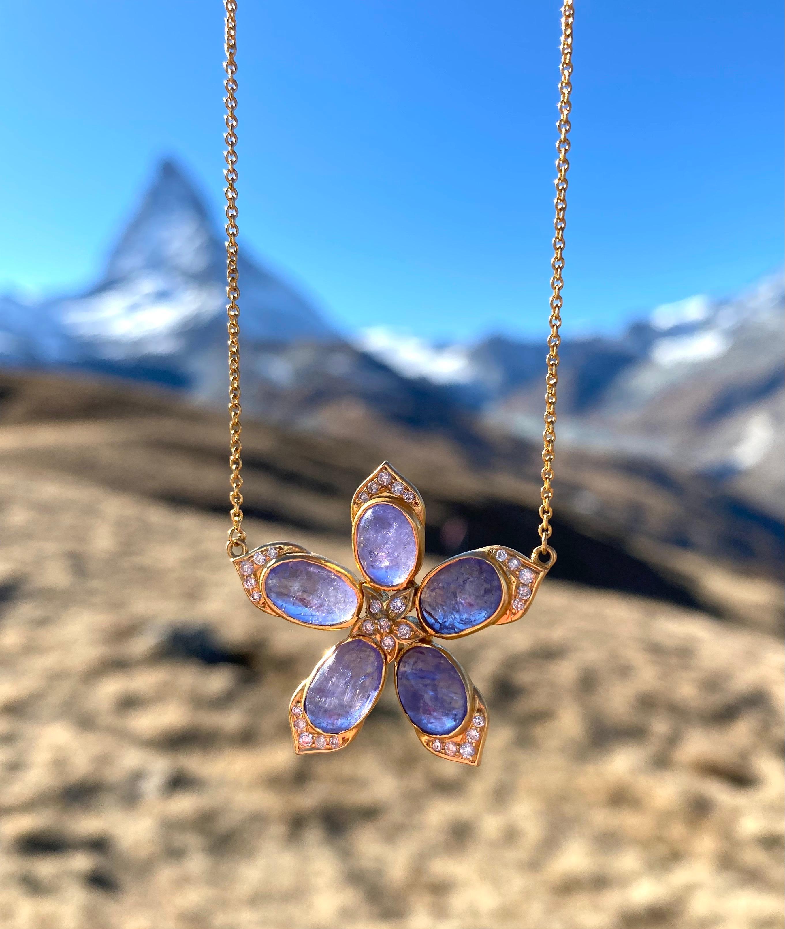 Designed by award winning designer, Lauren Harper, this Tanzanite and Diamond flower motif necklace is set in a warm 18kt Gold. Adjustable length from 14.25-15.75 inches.  Simple and elegant, this necklace will complete a outfit for a special