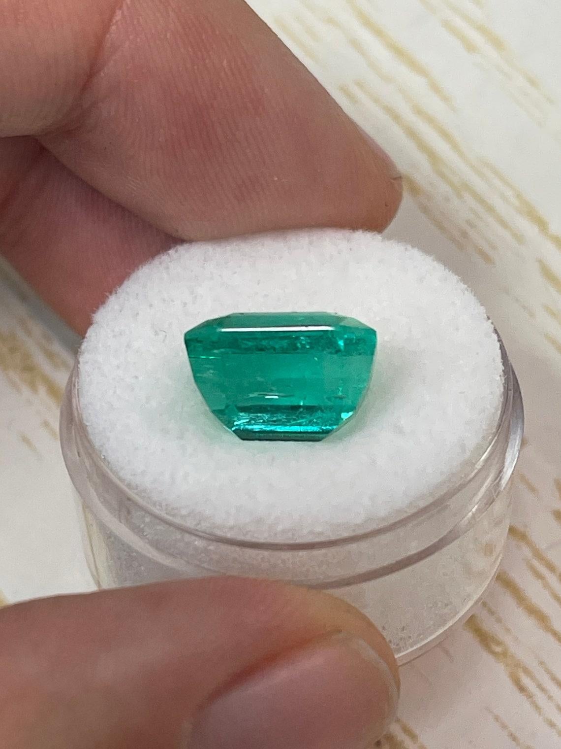 7.06 Carat 12x9.5 Glowing Bluish Green Colombian Emerald - Emerald Cut Muzo Mine For Sale 1