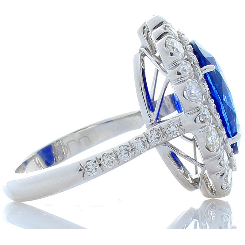 Contemporary 7.06 Carat Oval Blue Sapphire and Diamond Cocktail Ring in 18 Karat White Gold