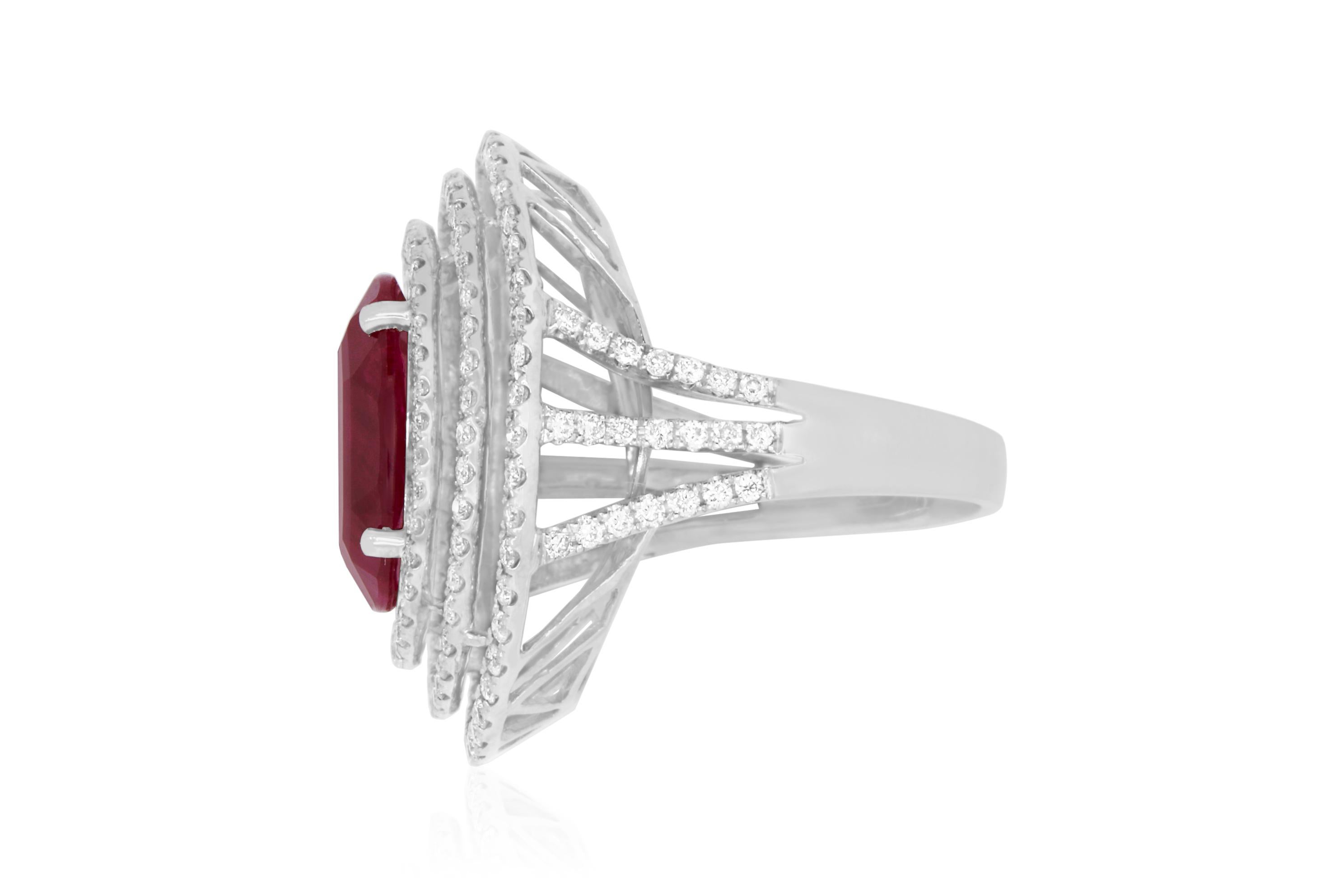 Material: 14k White Gold 
Center Stone Details: 7.06 Carat Oval Ruby
Mounting Diamond Details: Round White Diamonds Approximately 2.25 Carats - Clarity: SI / Color: H-I
Ring Size: Size 6.75. Alberto offers complimentary sizing on all rings.

Match