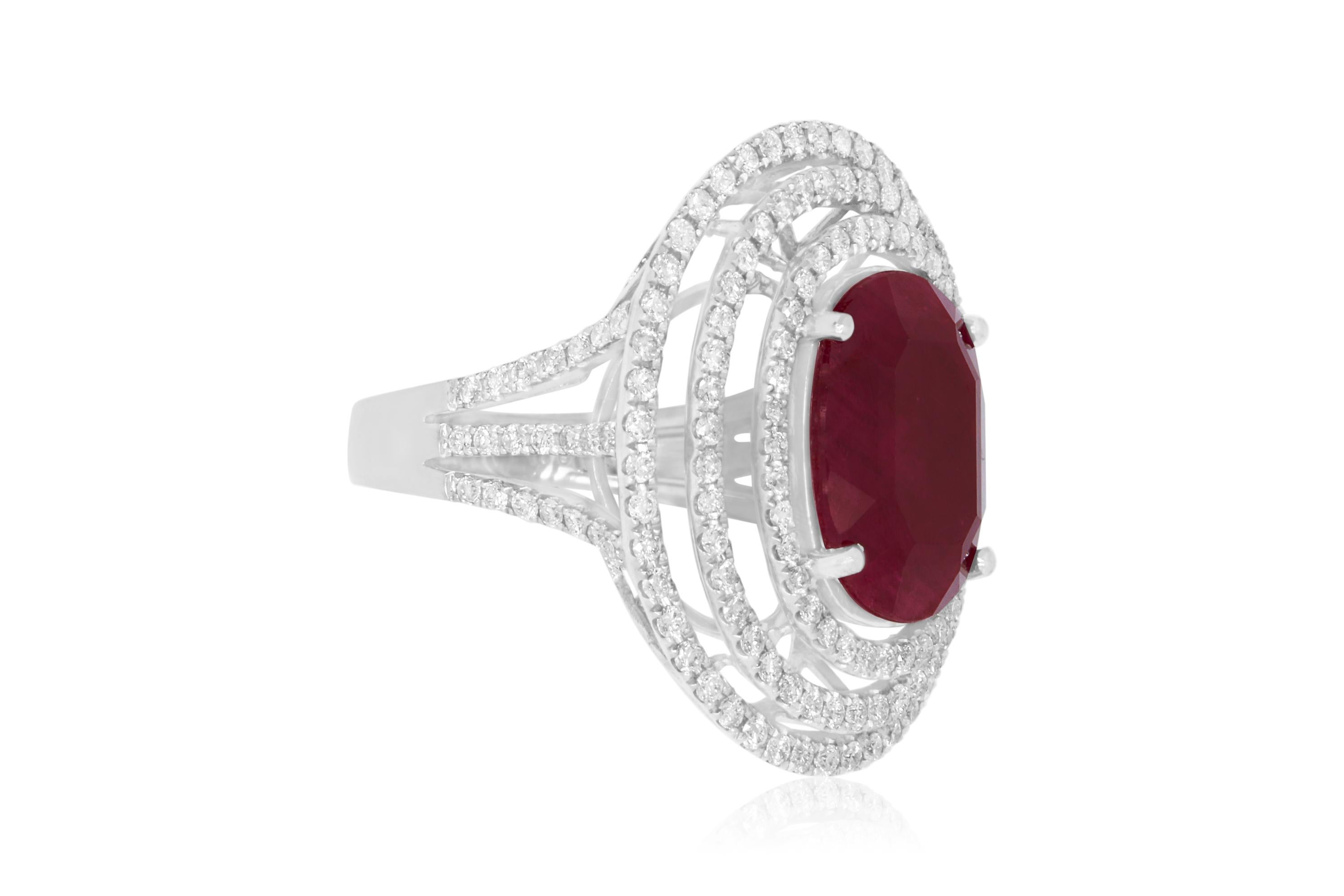 Oval Cut 7.06 Carat Oval Ruby and 2.25 Carat White Diamond Ring