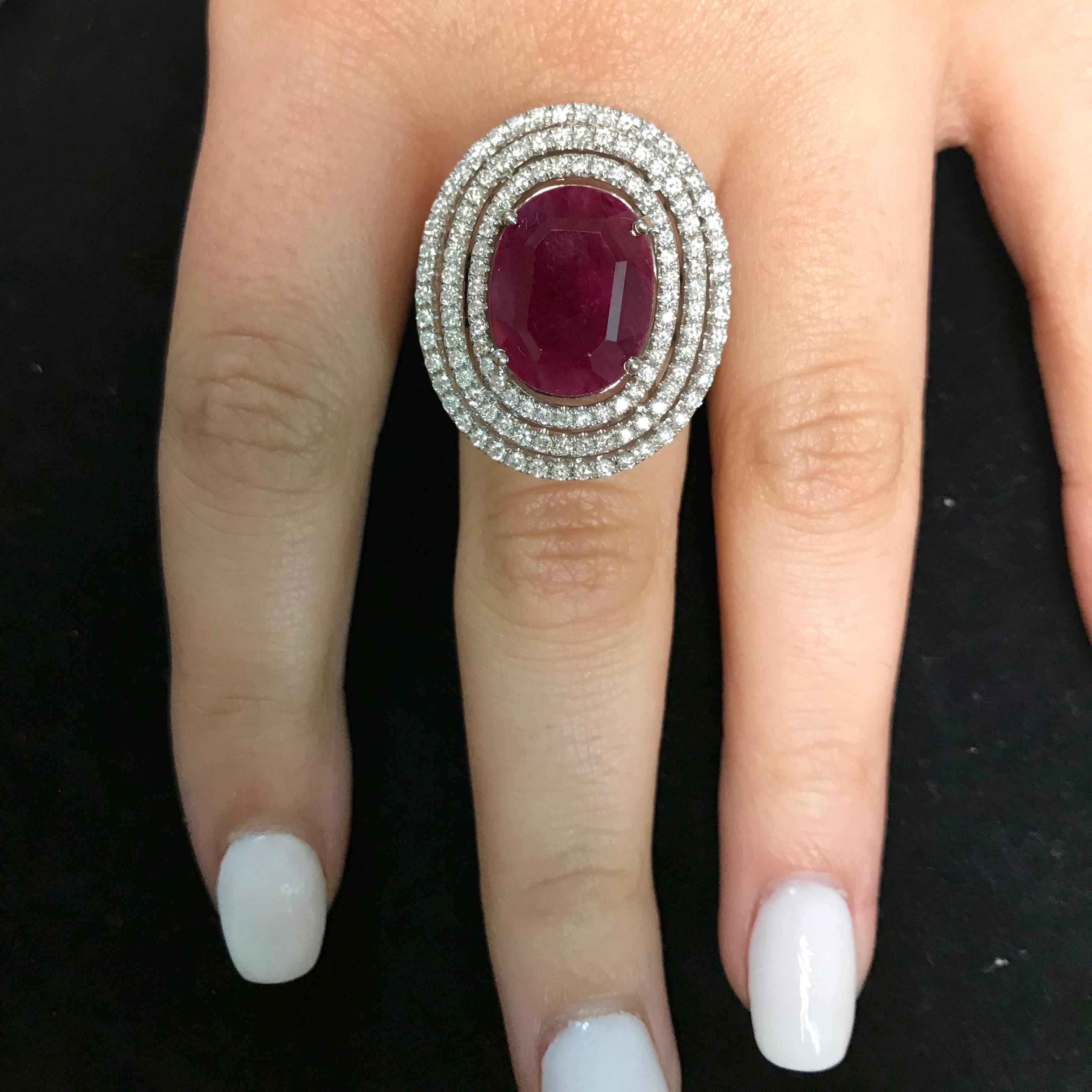 Women's 7.06 Carat Oval Ruby and 2.25 Carat White Diamond Ring
