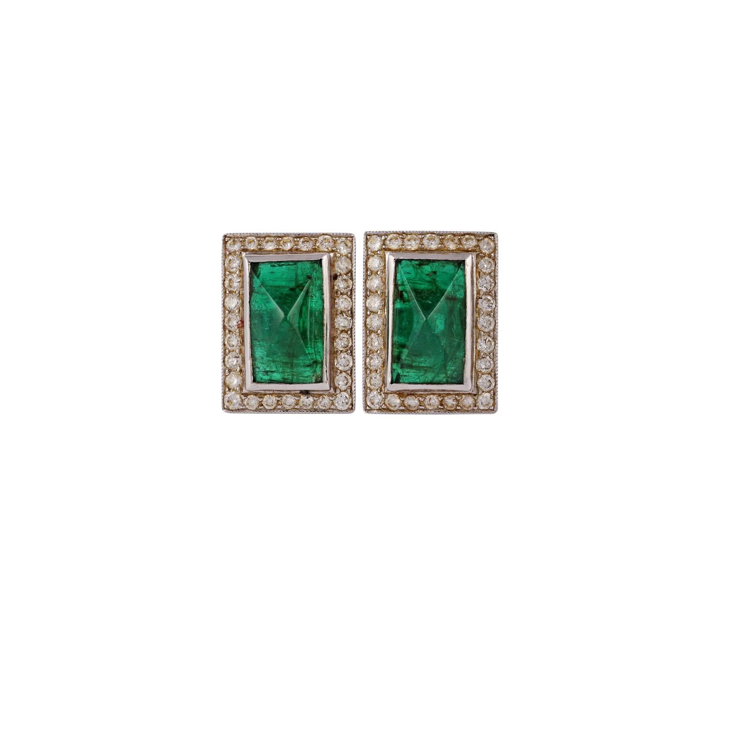 This is an elegant Stud earring pair with emerald & diamonds feature 2 pieces  emeralds weight 2.76carats, Diamonds weight 1.01 carat , these earrings entirely made in 18K white gold weight 6.24 grams.